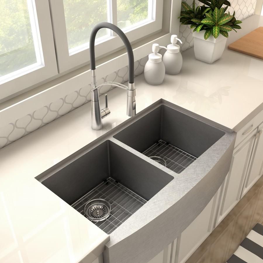 Brushed nickel kitchen faucet with tall arched spout and black handle accents over sink