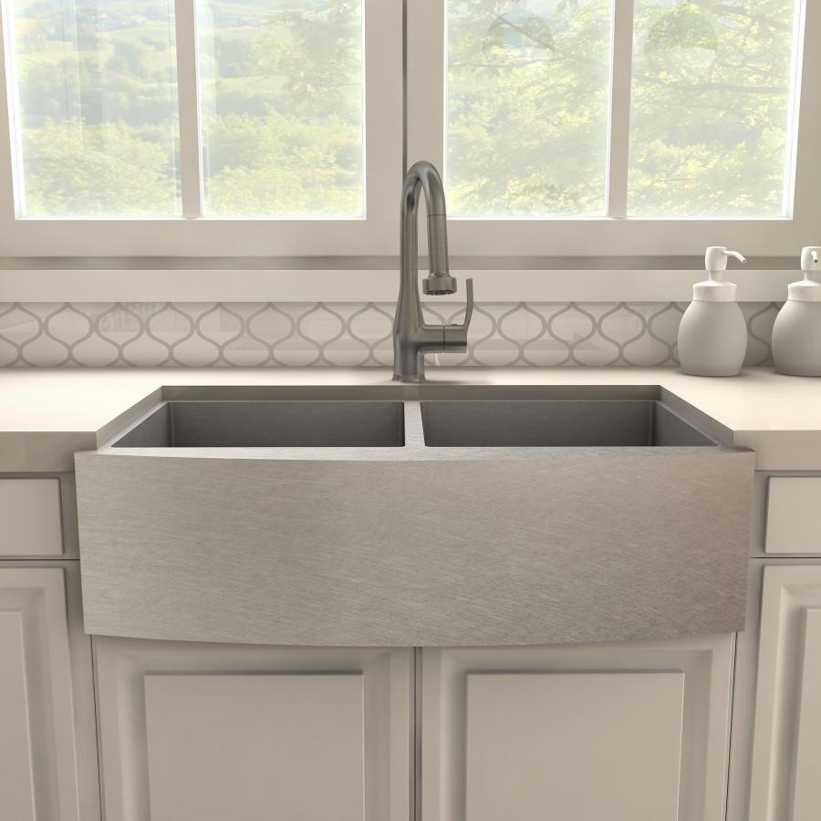 Gun metal kitchen faucet with tall curved spout and rectangular base
