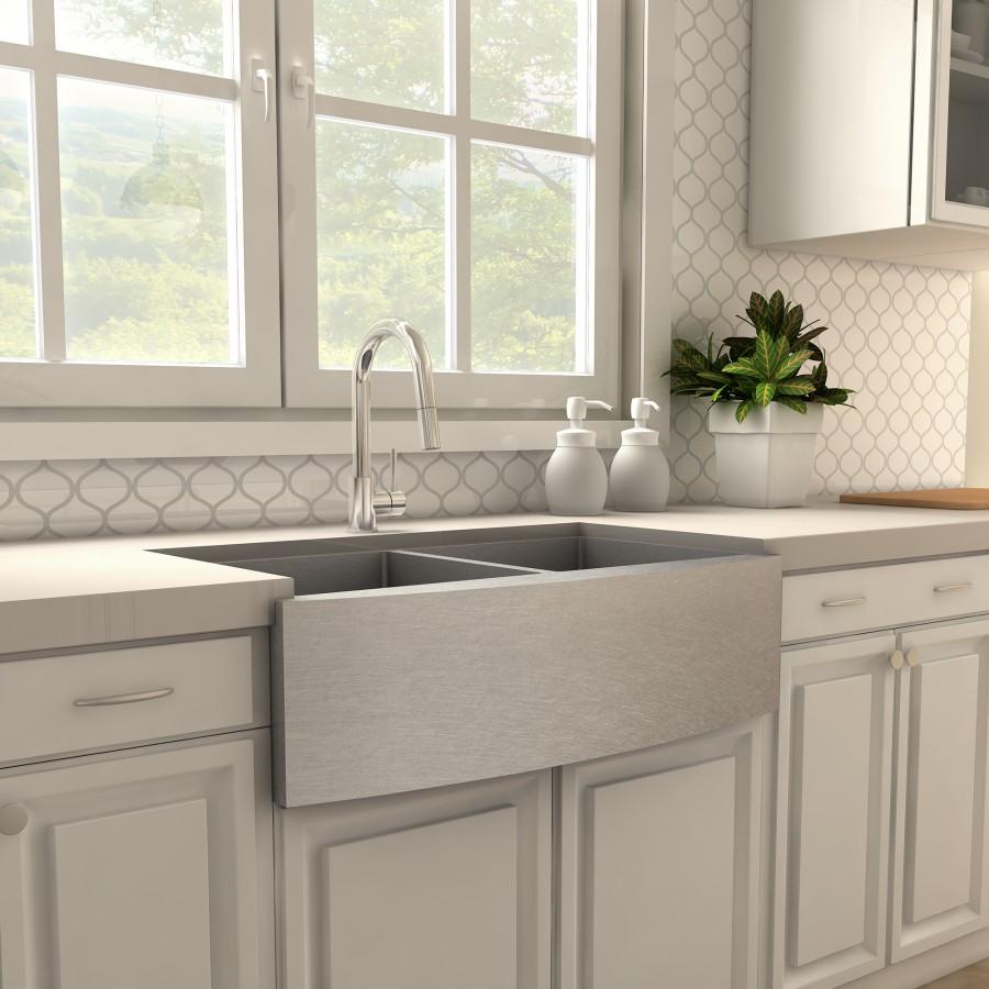 Chrome kitchen faucet over undermount sink