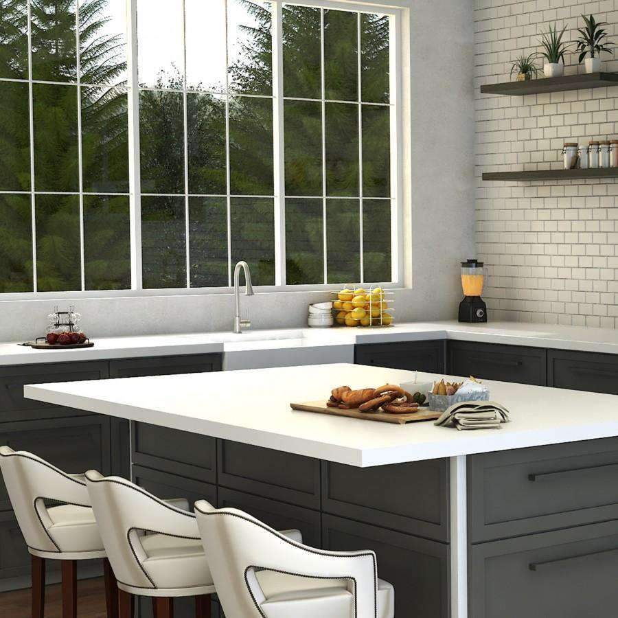 Brushed nickel kitchen faucet on sink countertop with tall arched spout