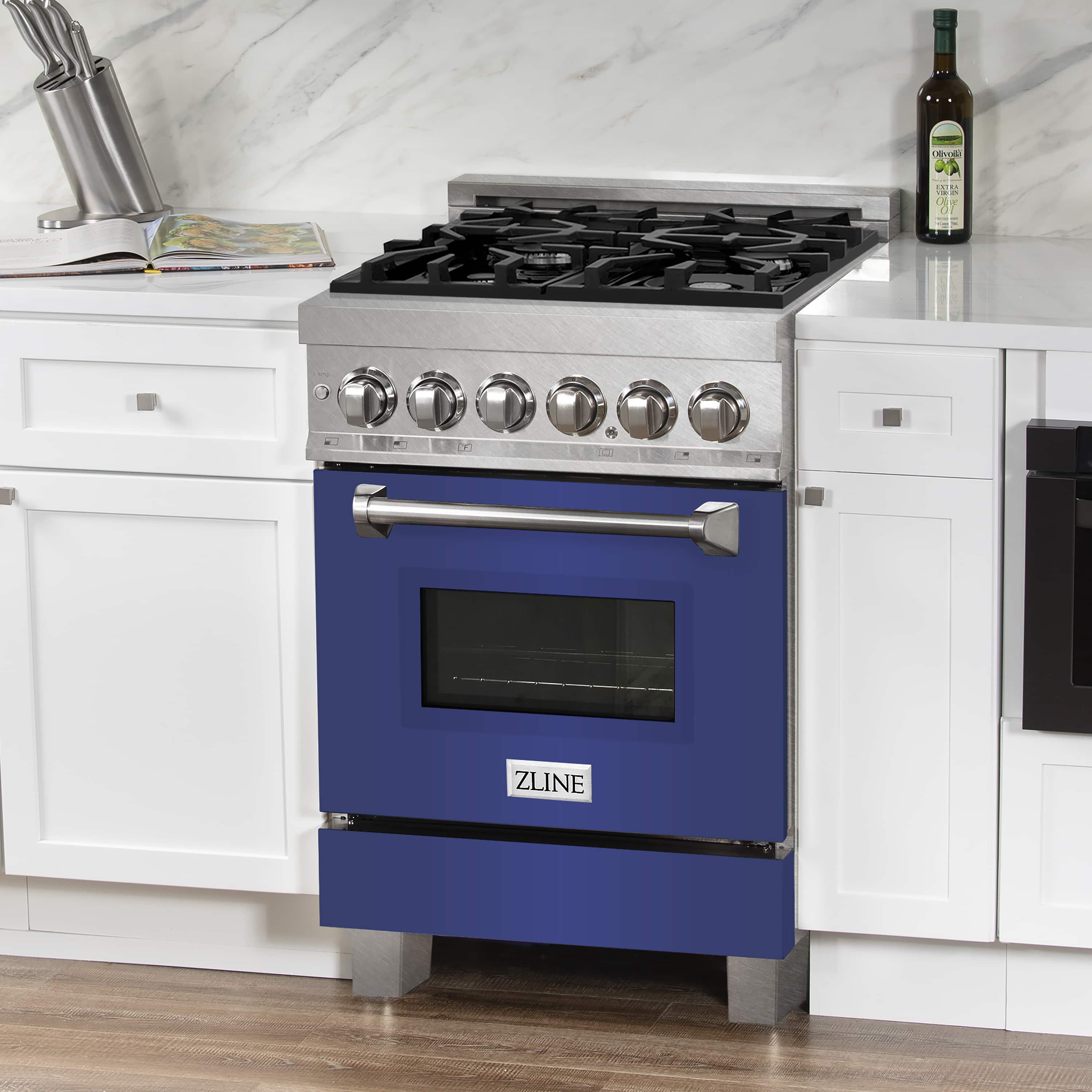 Dual fuel range with gas burners, satin stainless front, and blue matte oven door