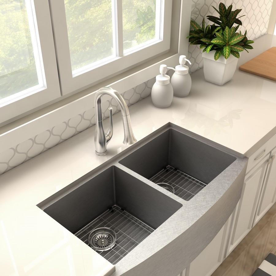 Brushed nickel kitchen faucet with arched spout over double sink and drain