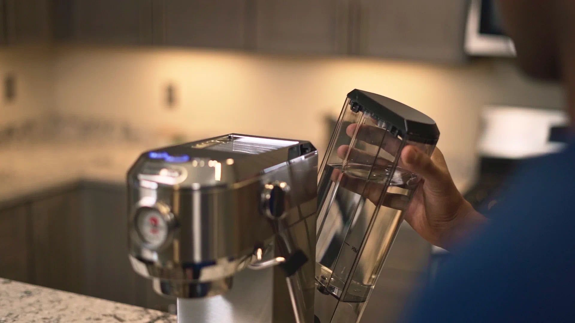 Stainless steel manual espresso machine with clear water tank and dispensing spout
