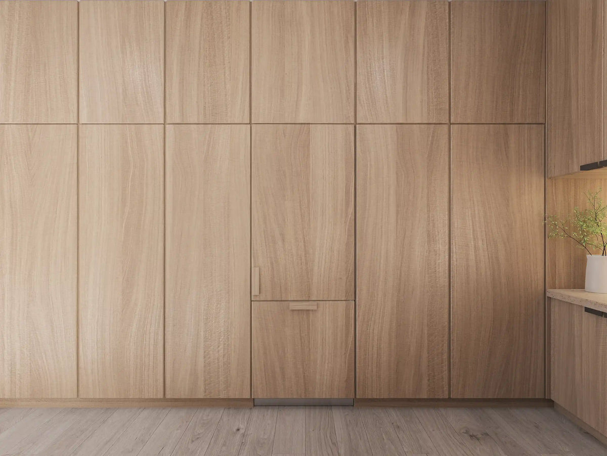 Panel-ready refrigerator front with flat wood panel doors and recessed handle