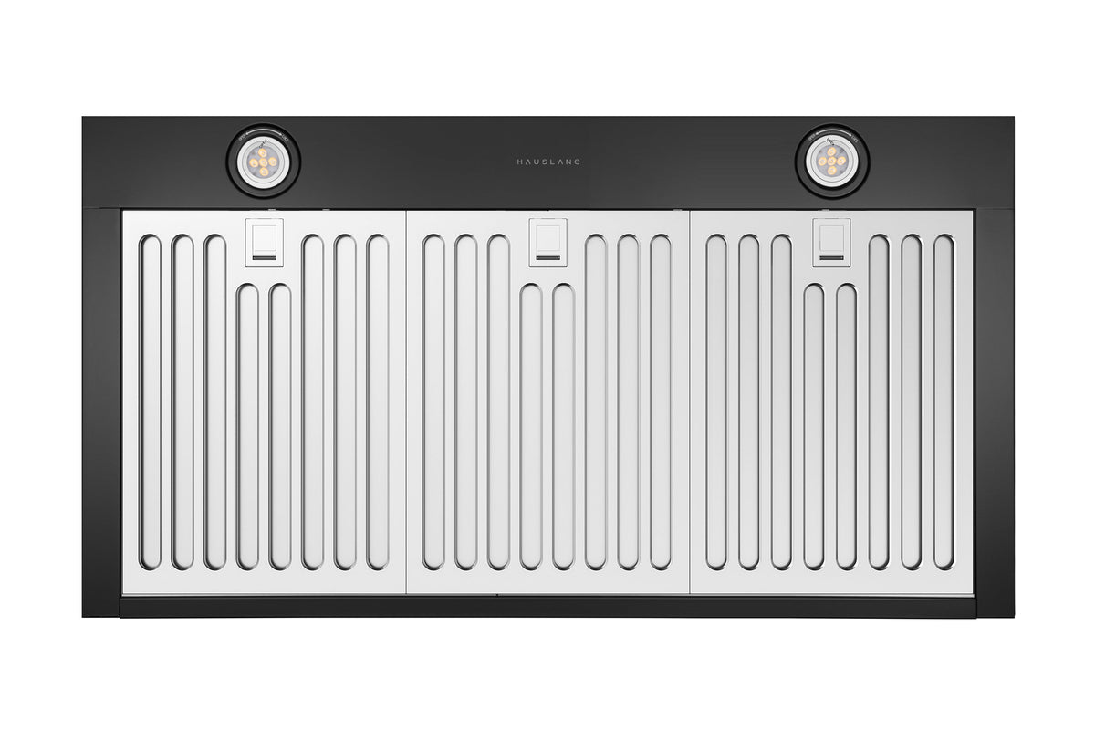 Wall-mount range hood, matte black vent panel with two LED light spots