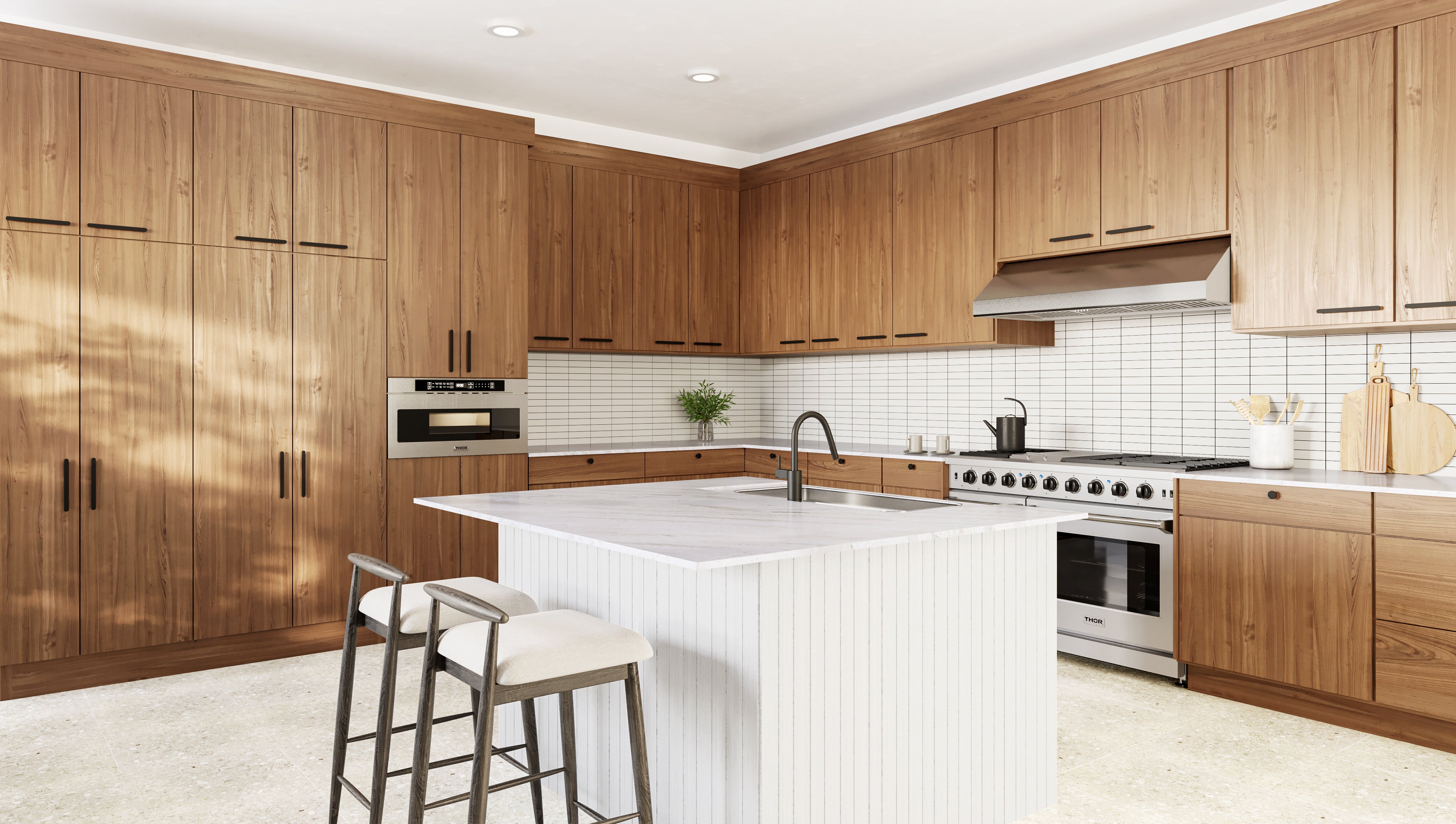 Stainless microwave drawer built into kitchen cabinetry above the range