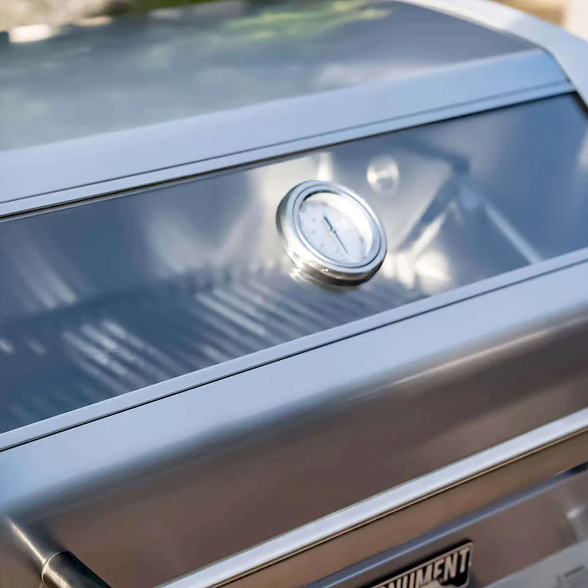 Stainless steel grill thermometer gauge on the lid
