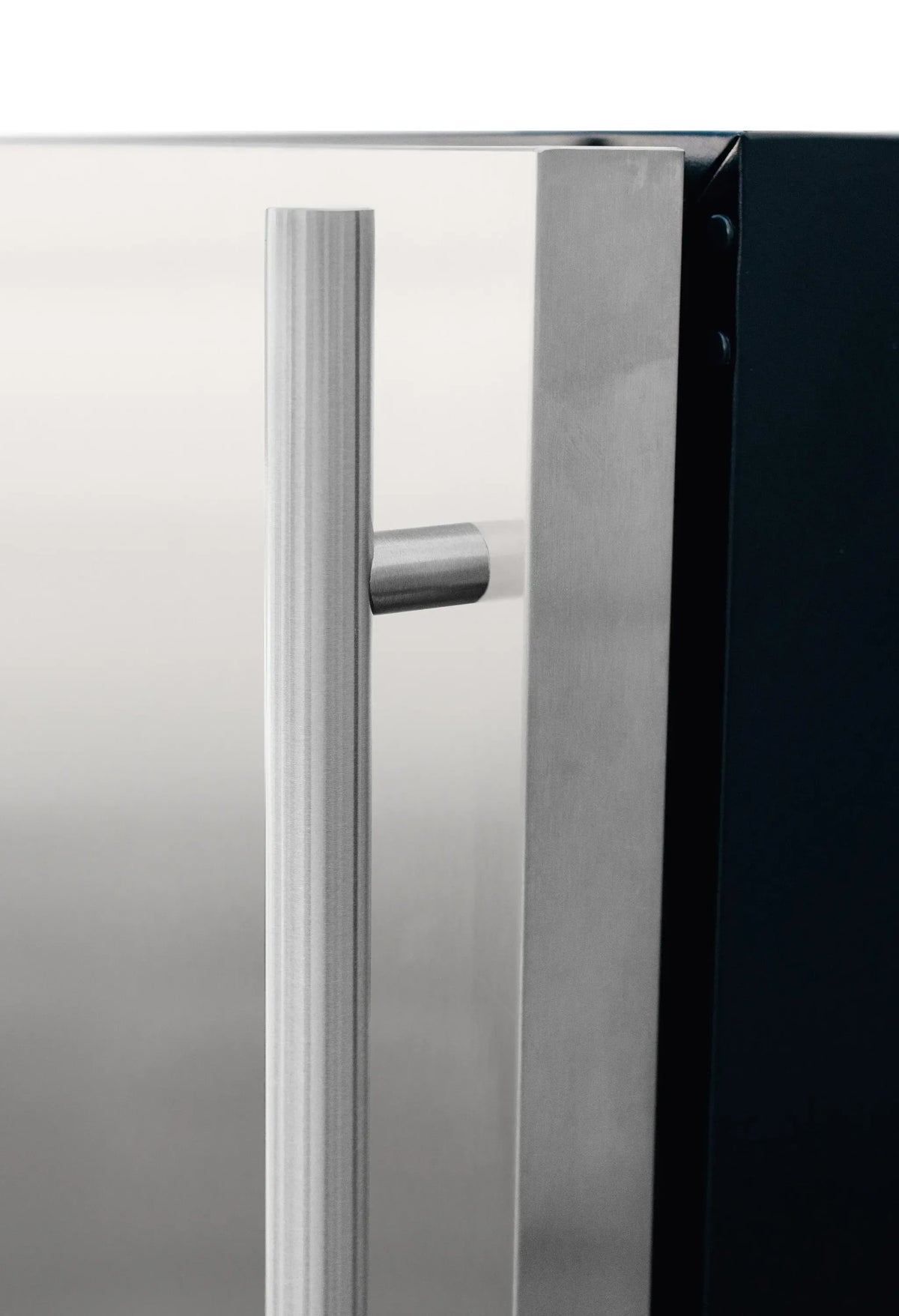 Stainless steel fridge door handle with left-hinge detail