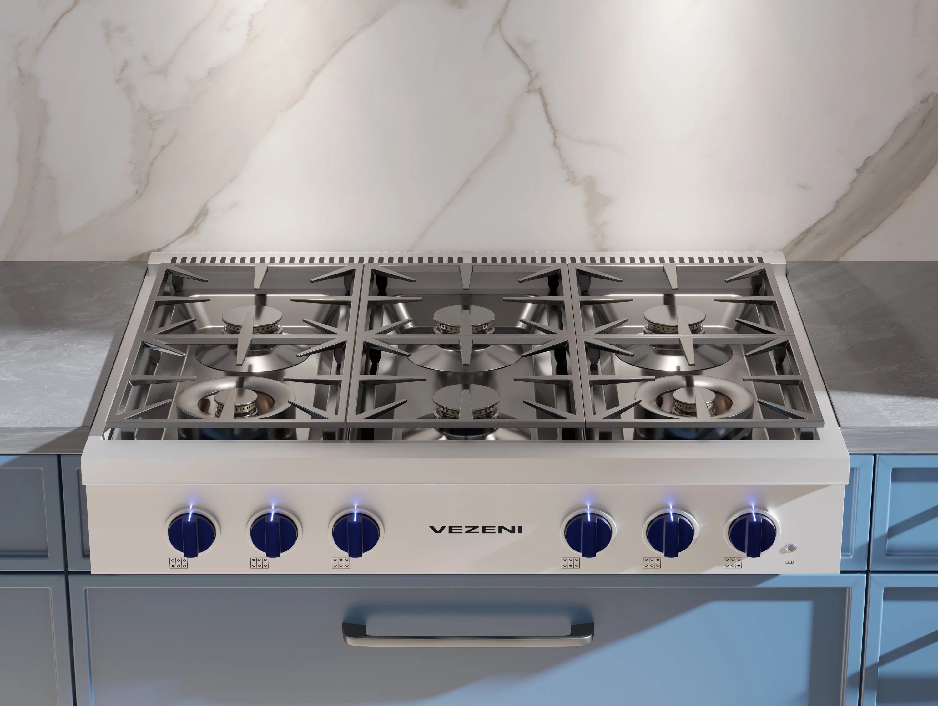 Stainless gas rangetop with four burners, black grates, and blue control knobs
