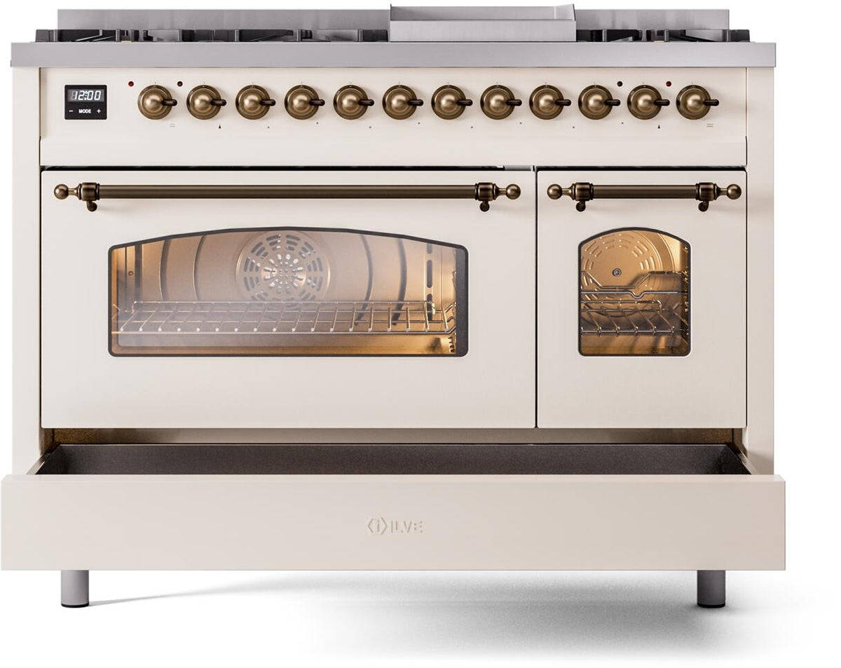 Antique white dual-fuel range with lit oven window and bronze-trimmed door handles