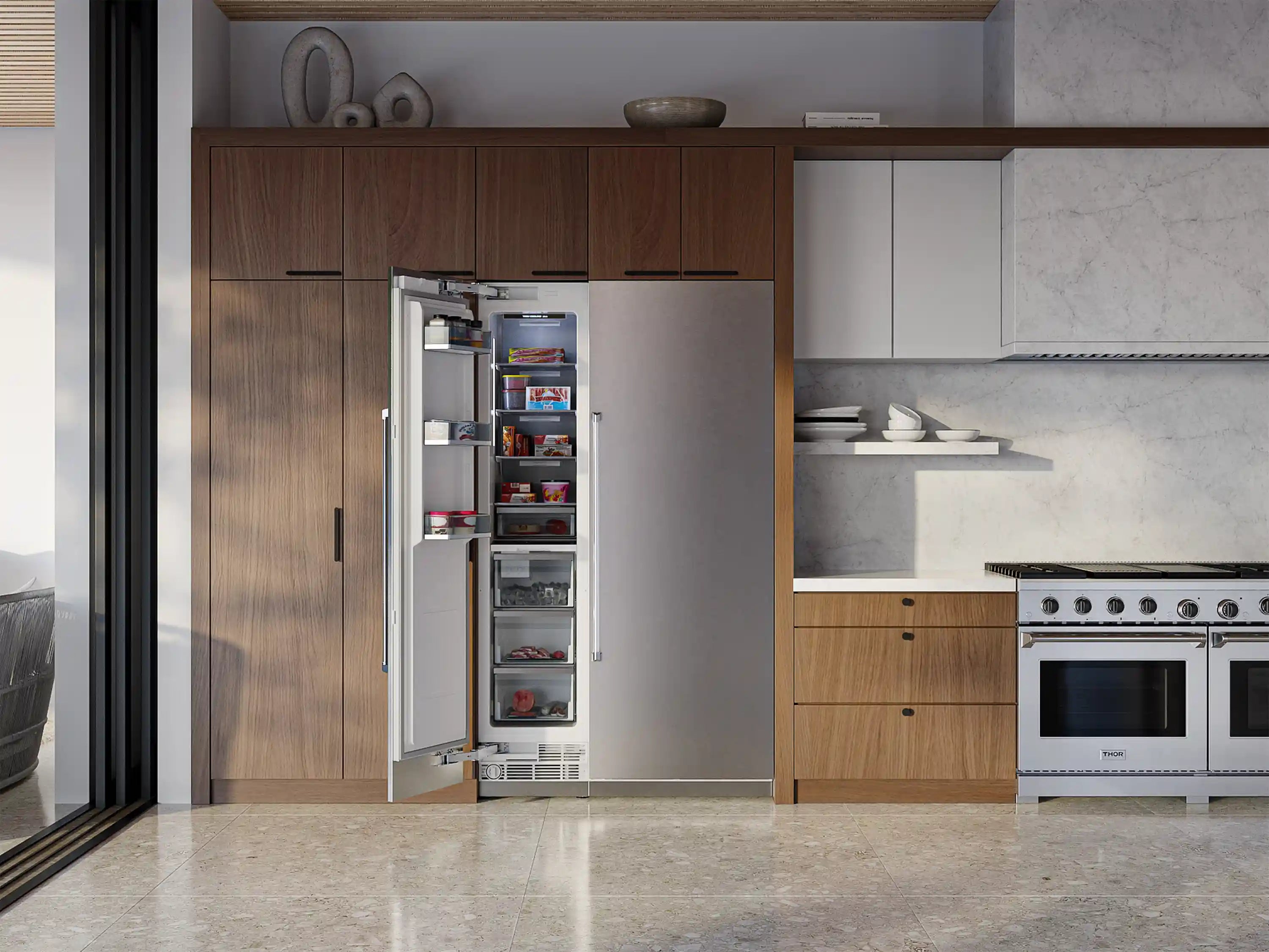 Built-in stainless column refrigerator-freezer with open left door and visible shelving