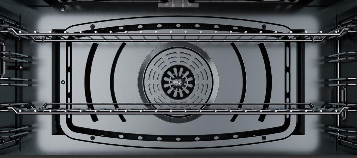 Oven interior view with convection fan and dark enamel walls