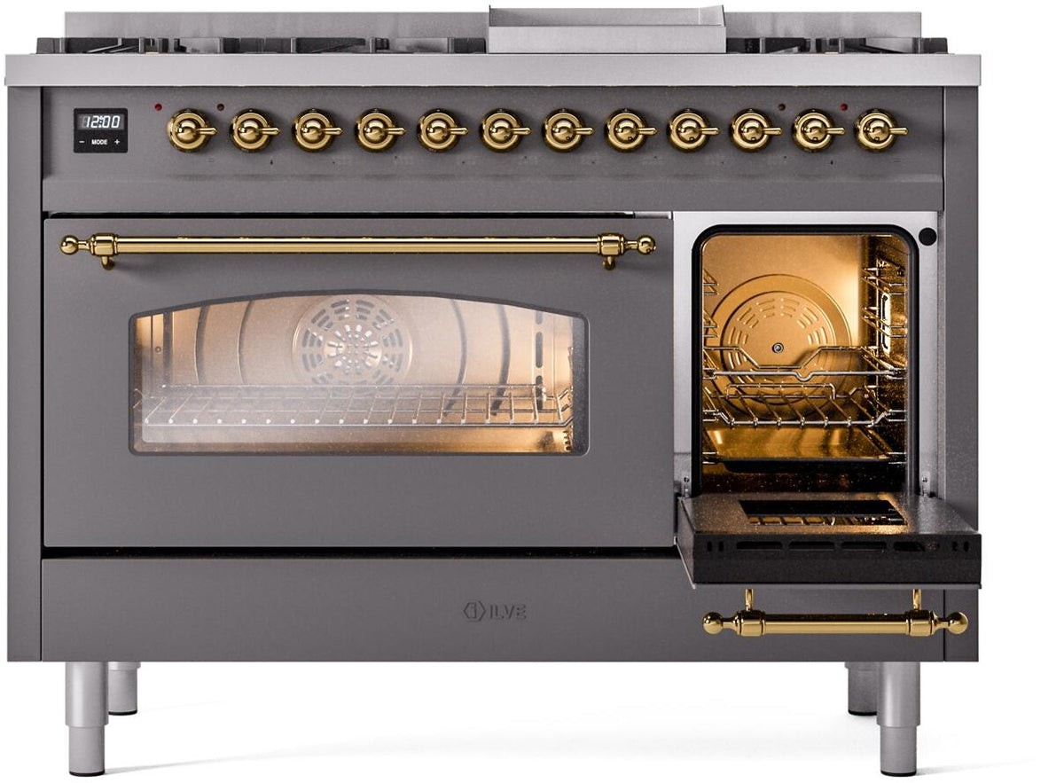 Matte graphite range with main oven door open, warming oven window, and brass trim