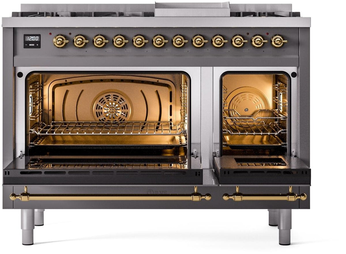 Matte graphite range with both oven doors open, brass trims, and burner knobs across top