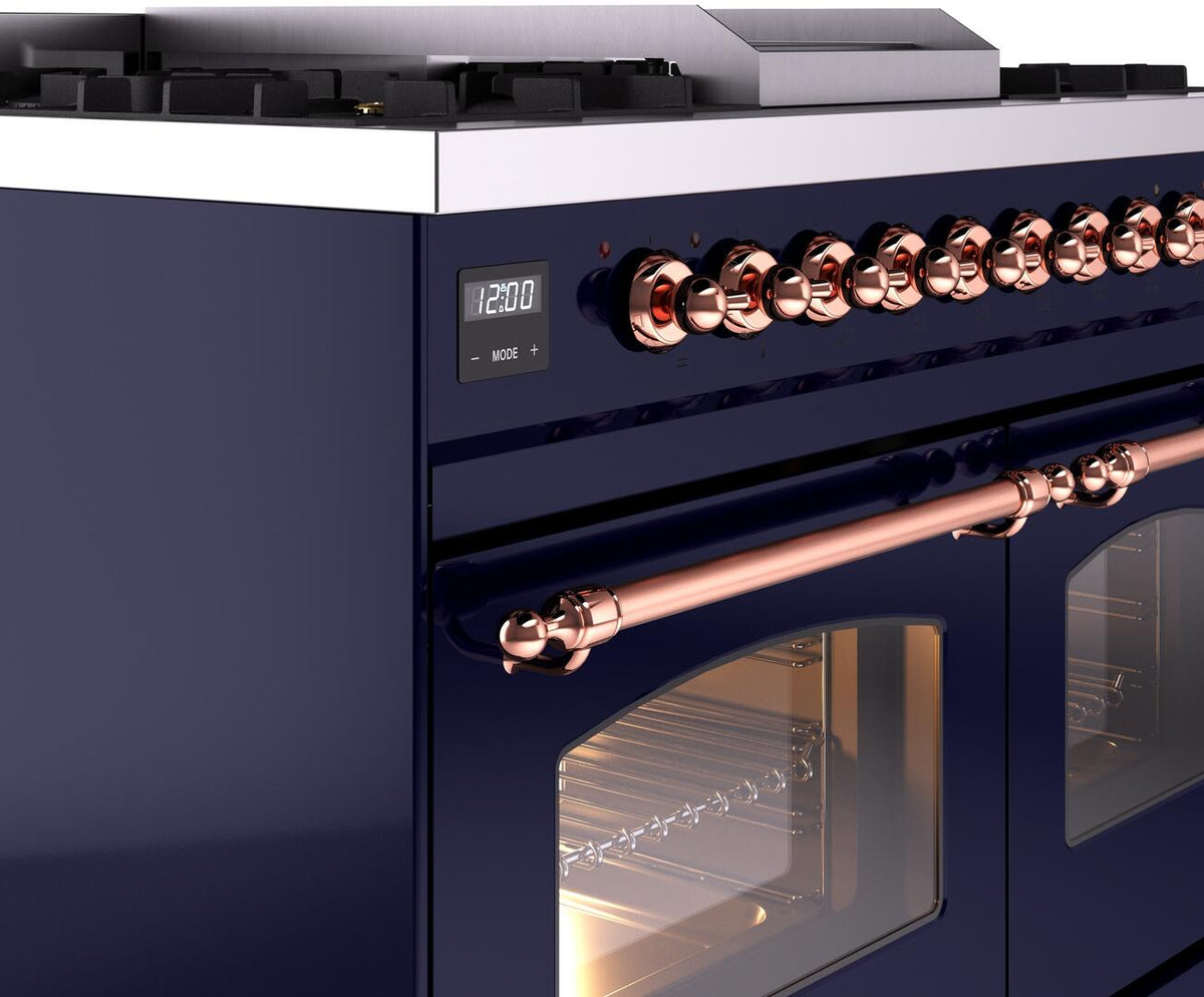Midnight blue range control panel with copper burner knobs and oven door