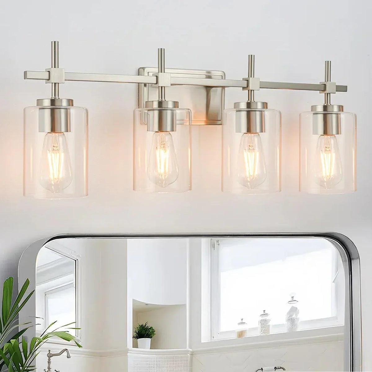 Brushed nickel 4-light linear vanity light with clear glass shades