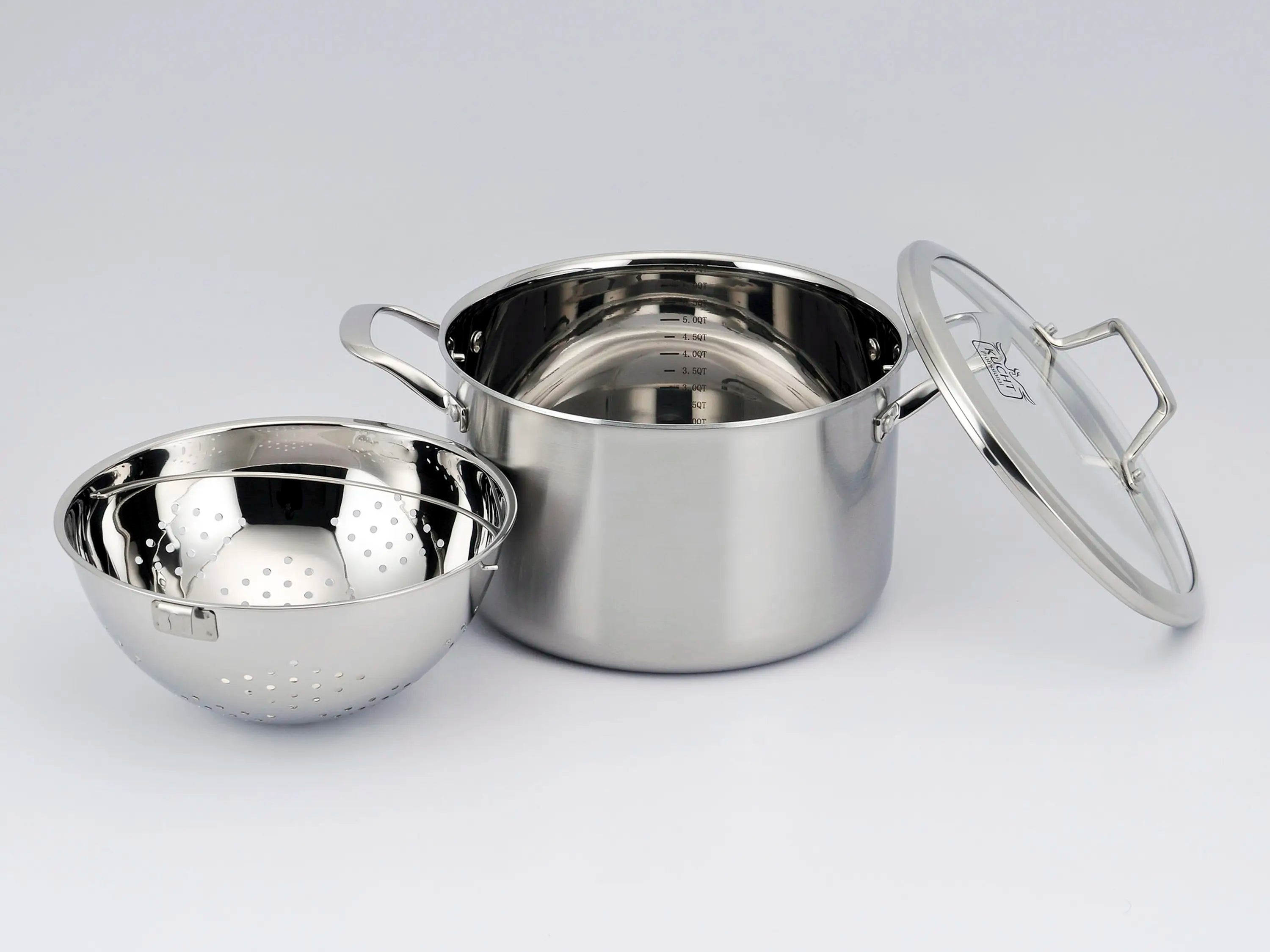 Stainless steel stockpot with perforated steamer insert and lid