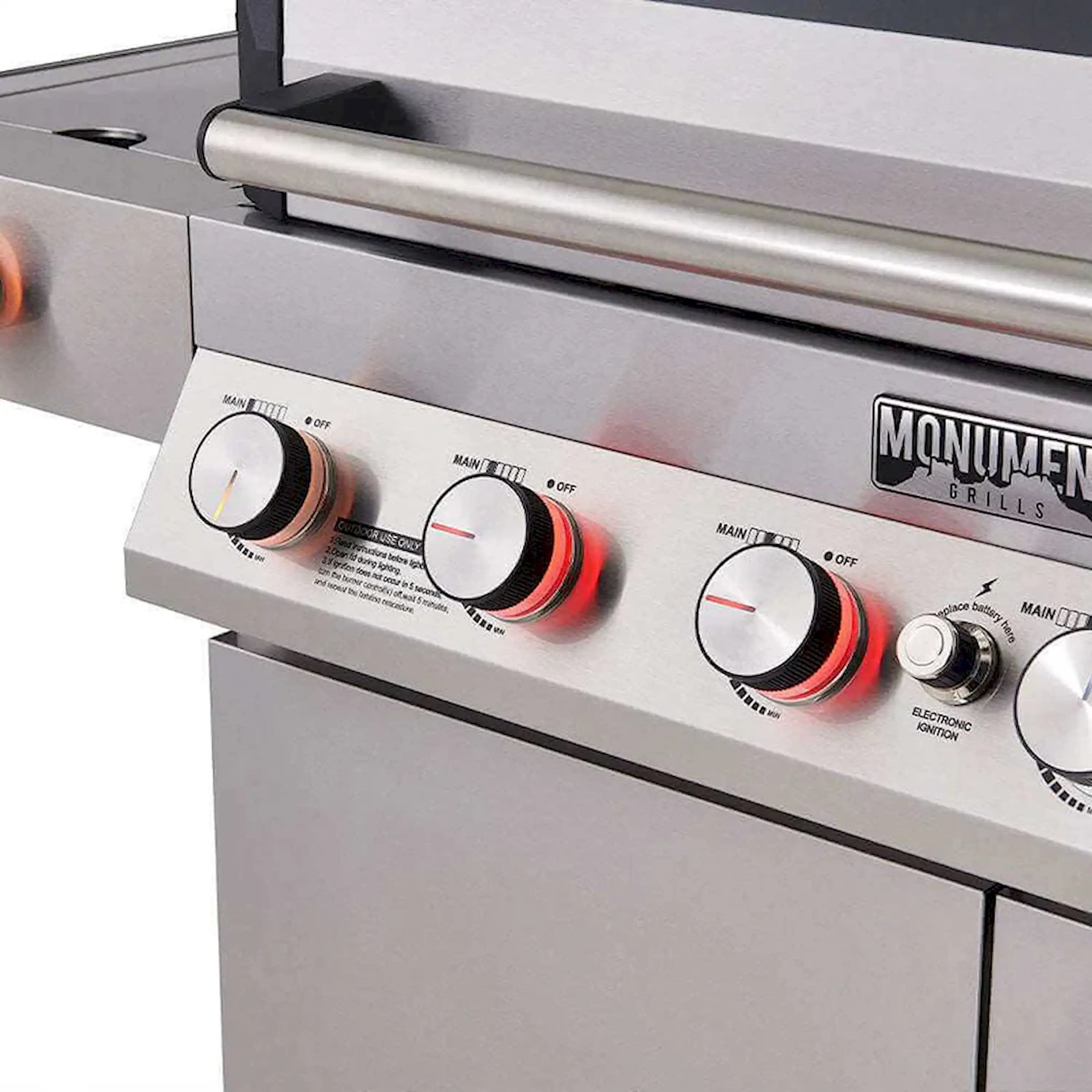 Stainless gas grill control panel with multiple temperature knobs