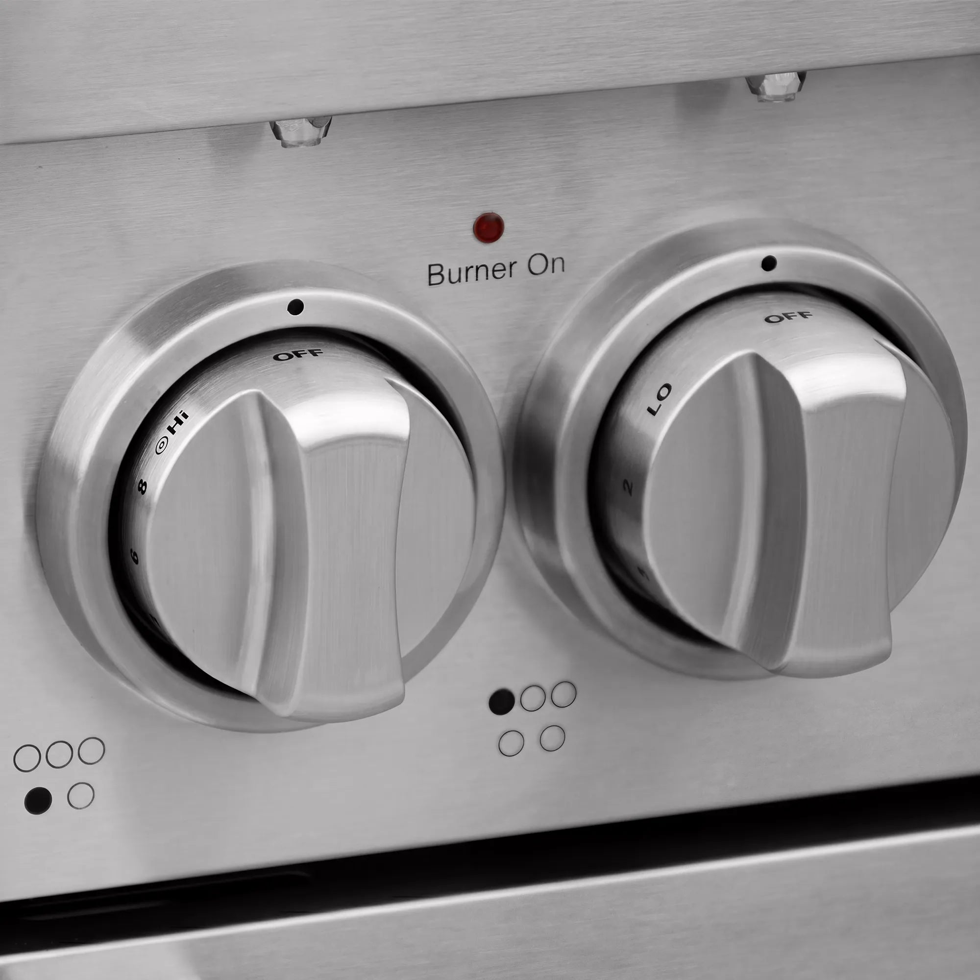 Stainless electric range front with two burner knobs and “Burner On” indicator