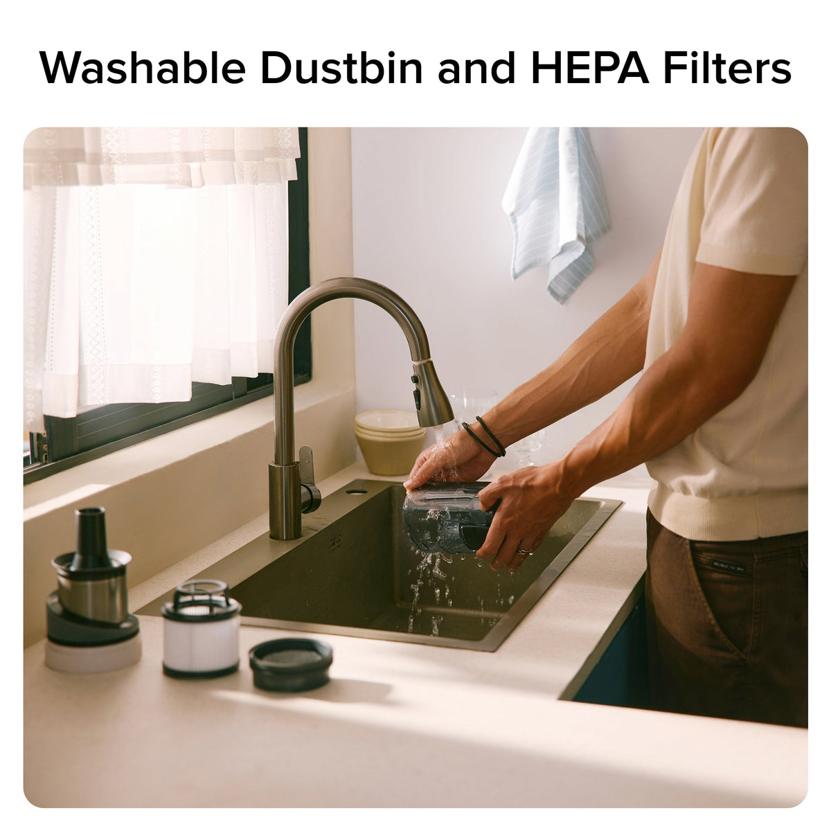 Washable dustbin and HEPA filters with detachable bin rinsed at kitchen sink