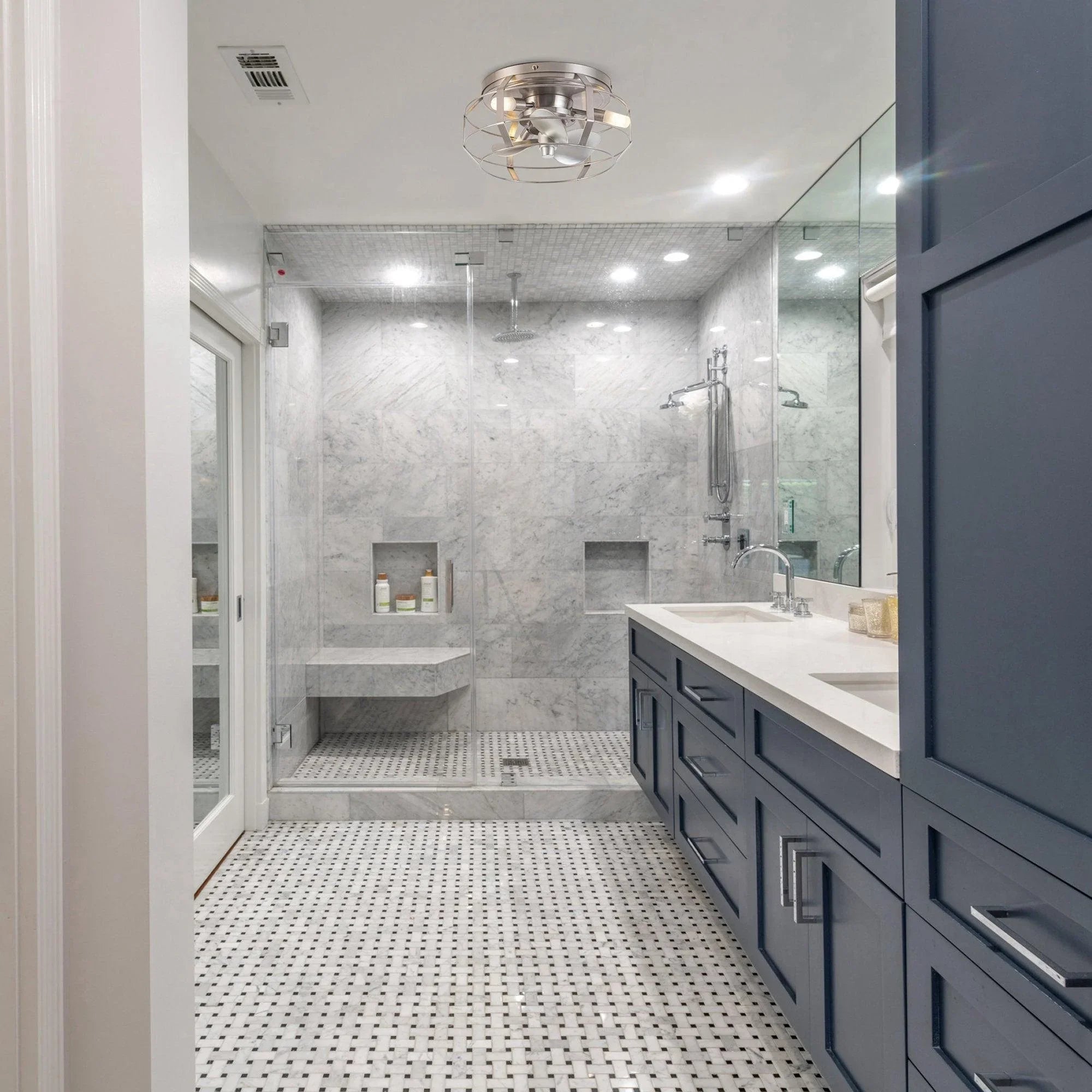 Satin nickel caged flush-mount ceiling fan with integrated light on the ceiling