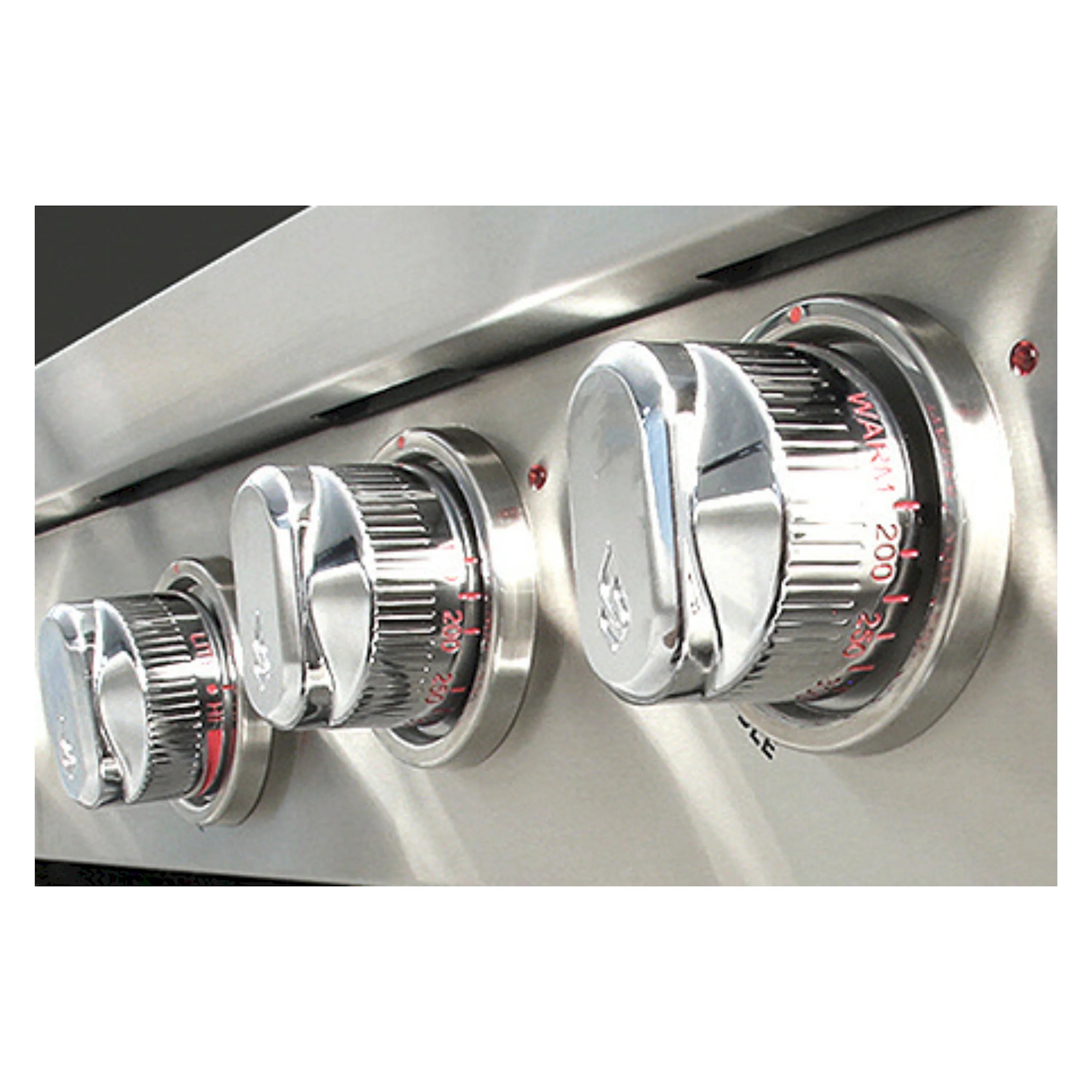 Chrome gas range knobs with red markings on stainless control panel
