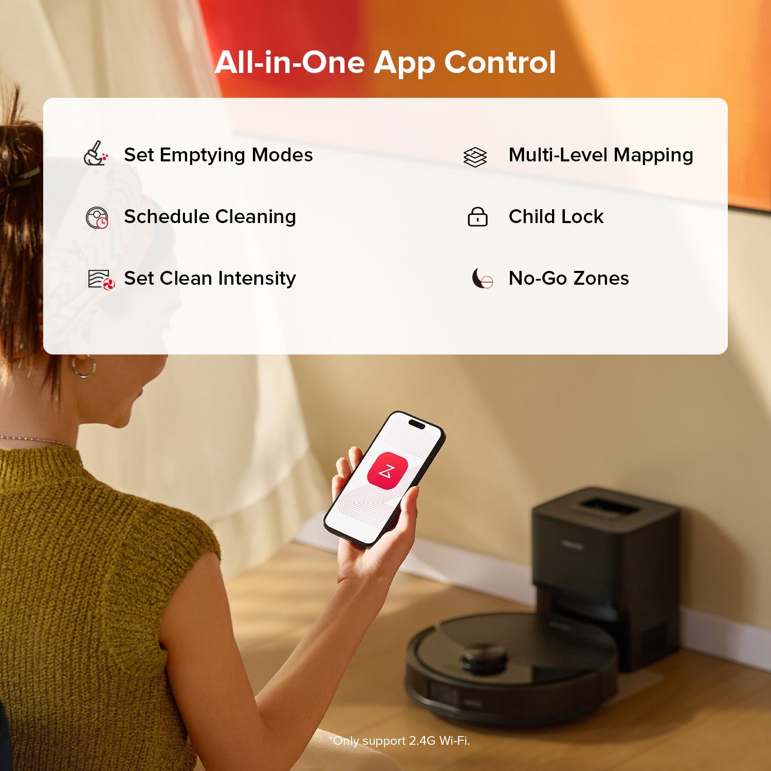 Black robot vacuum controlled by a smartphone app, with cleaning mode icons displayed.