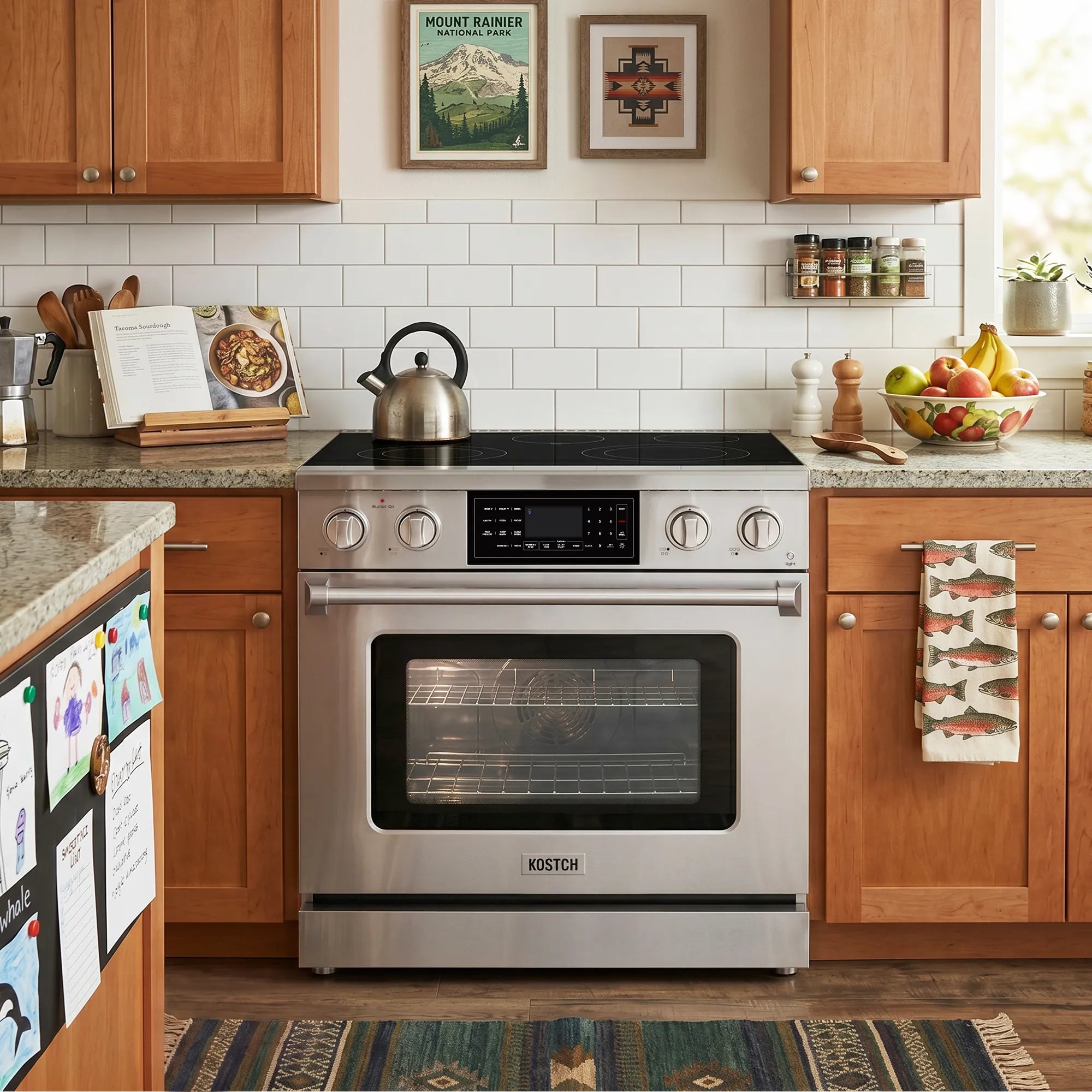 Stainless steel electric range in a kitchen with black glass cooktop and oven window
