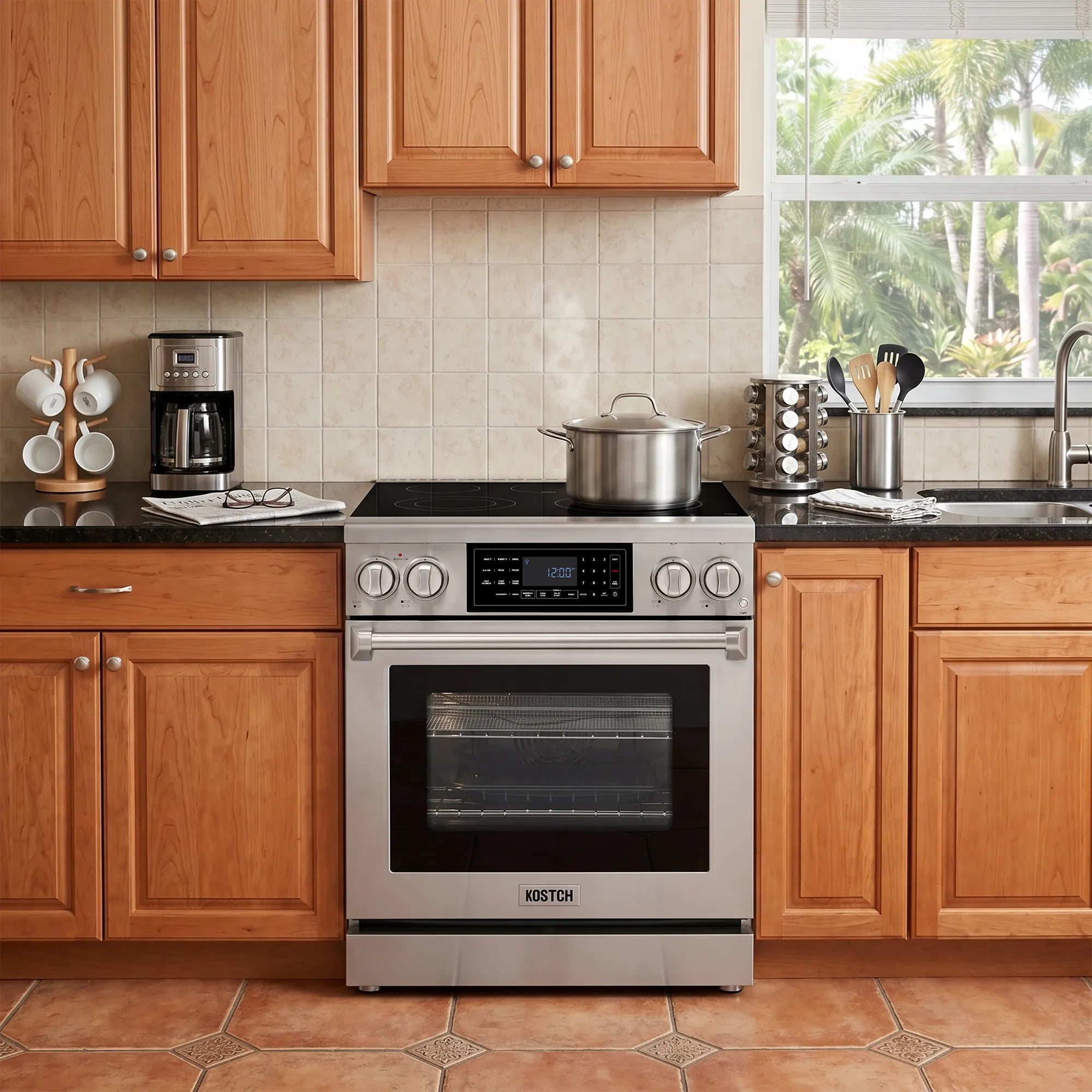 Stainless electric range in a kitchen with oven door and cooktop controls