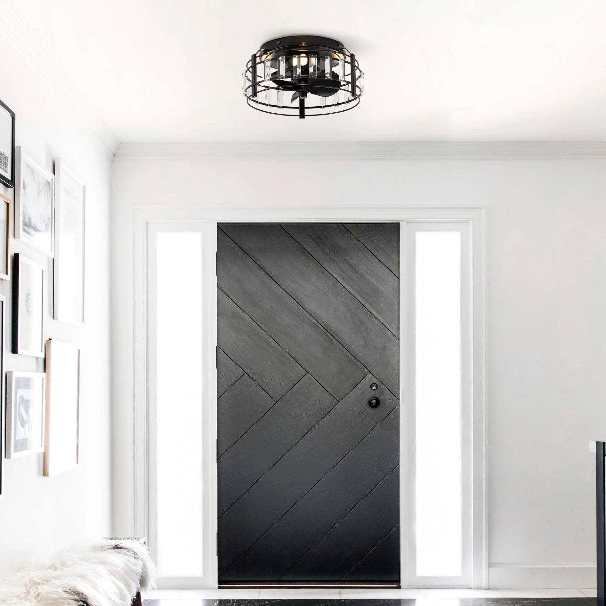 Black flush-mount ceiling fan with clear crystal cage and integrated light