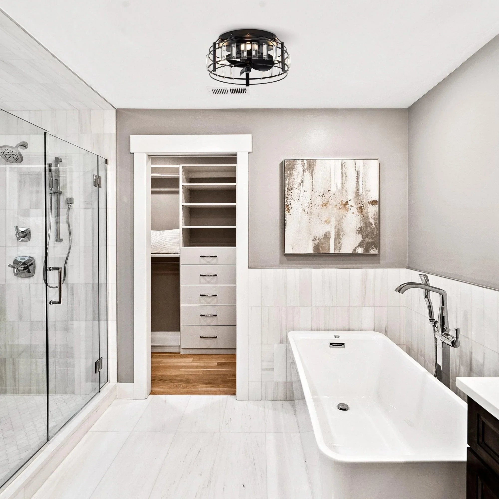 Black flush-mount ceiling fan with clear crystal lighting panels above tub