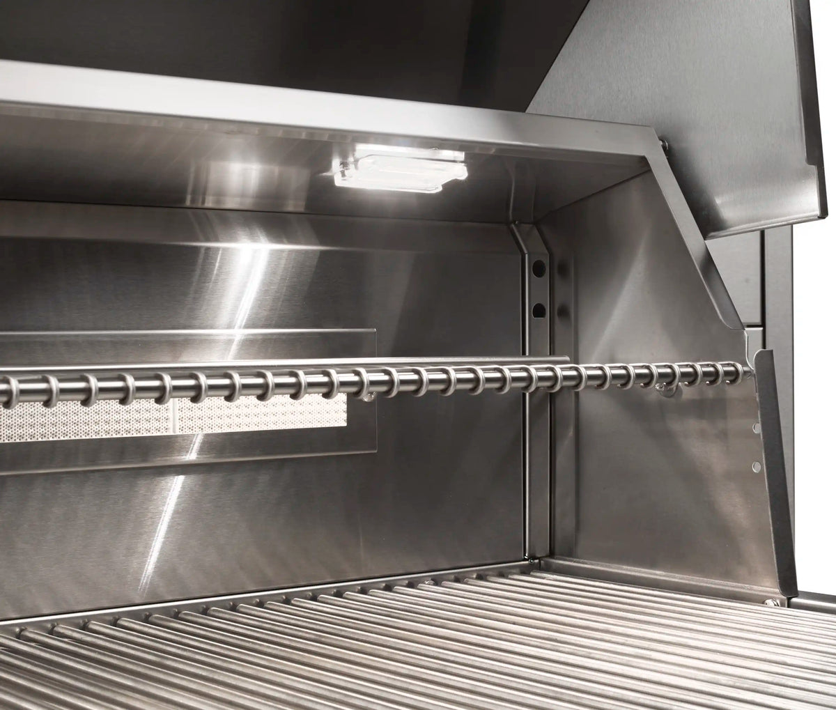 Stainless grill interior with heating rods and back wall panel