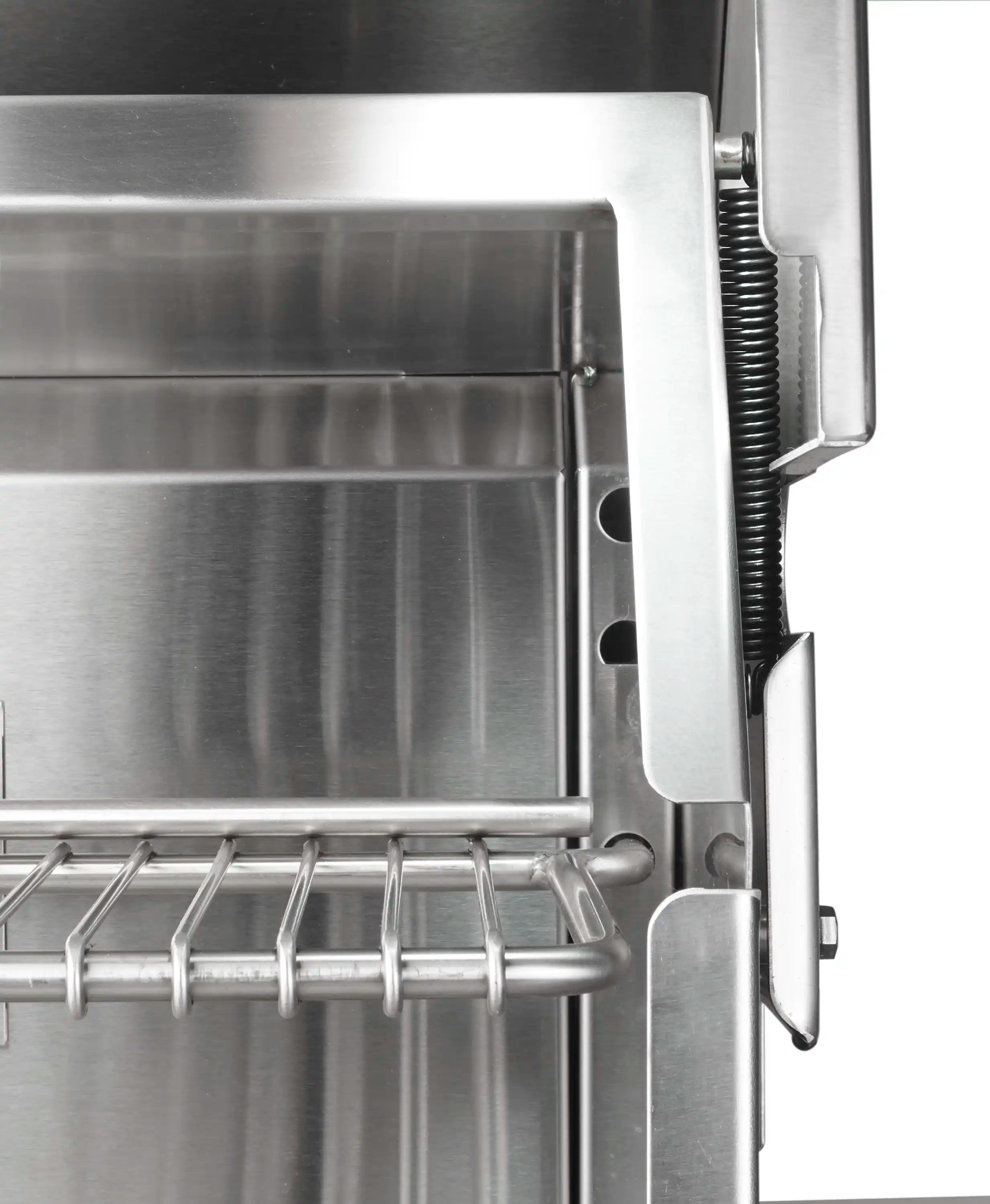 Stainless grill side component with latch spring and internal heat shield