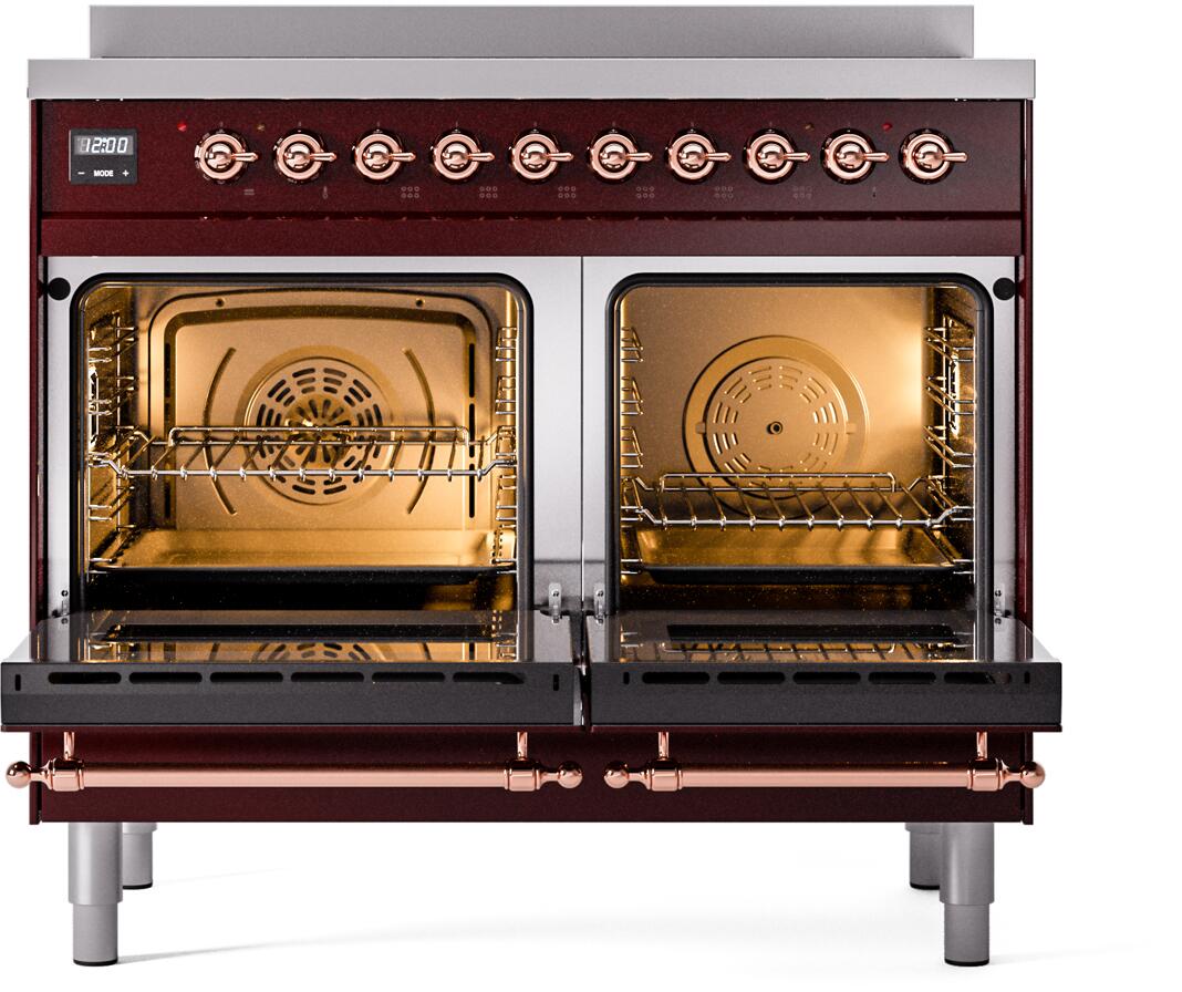 Burgundy induction range with open double ovens, racks, and warm interior lights