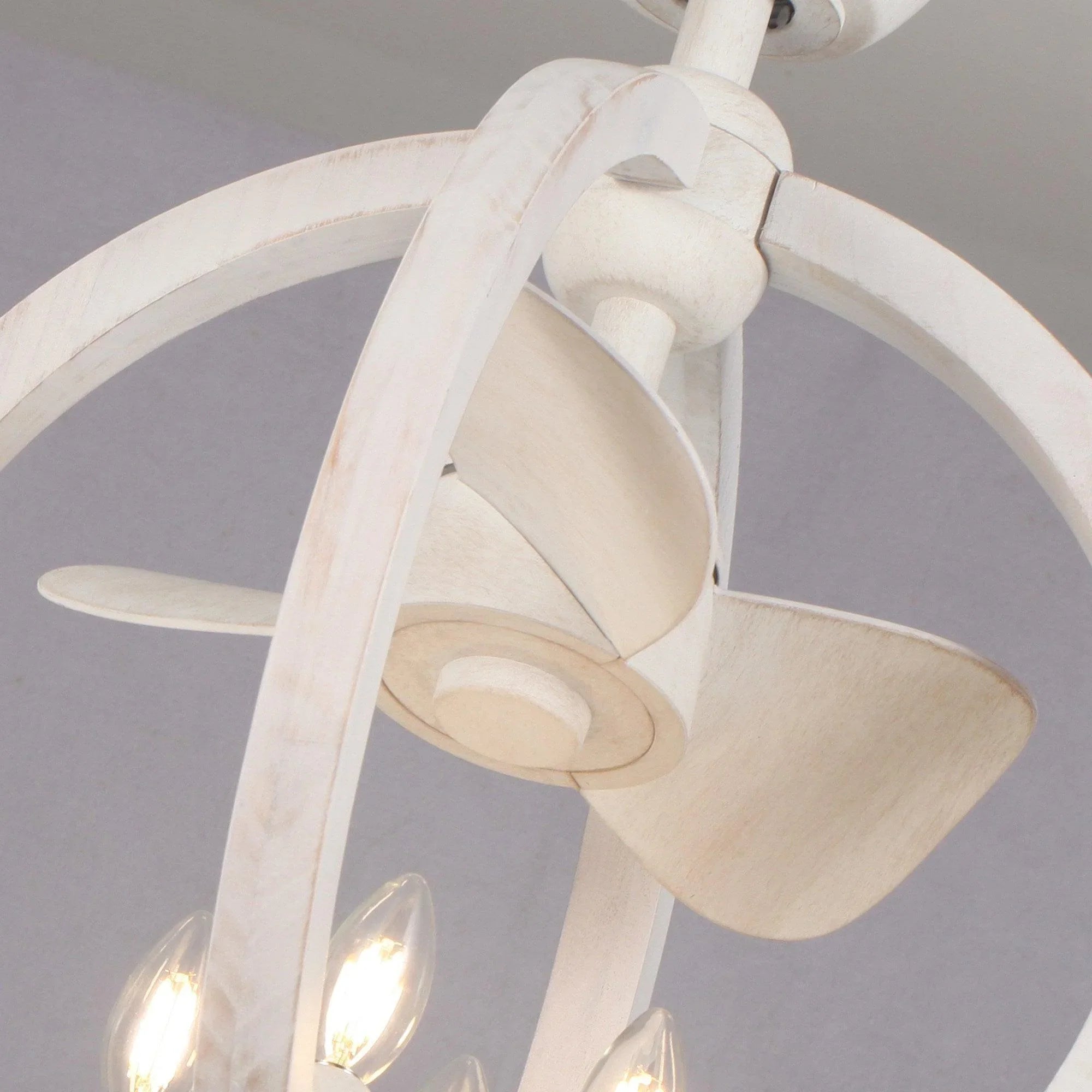 White modern ceiling fan with curved blades and central downrod motor housing
