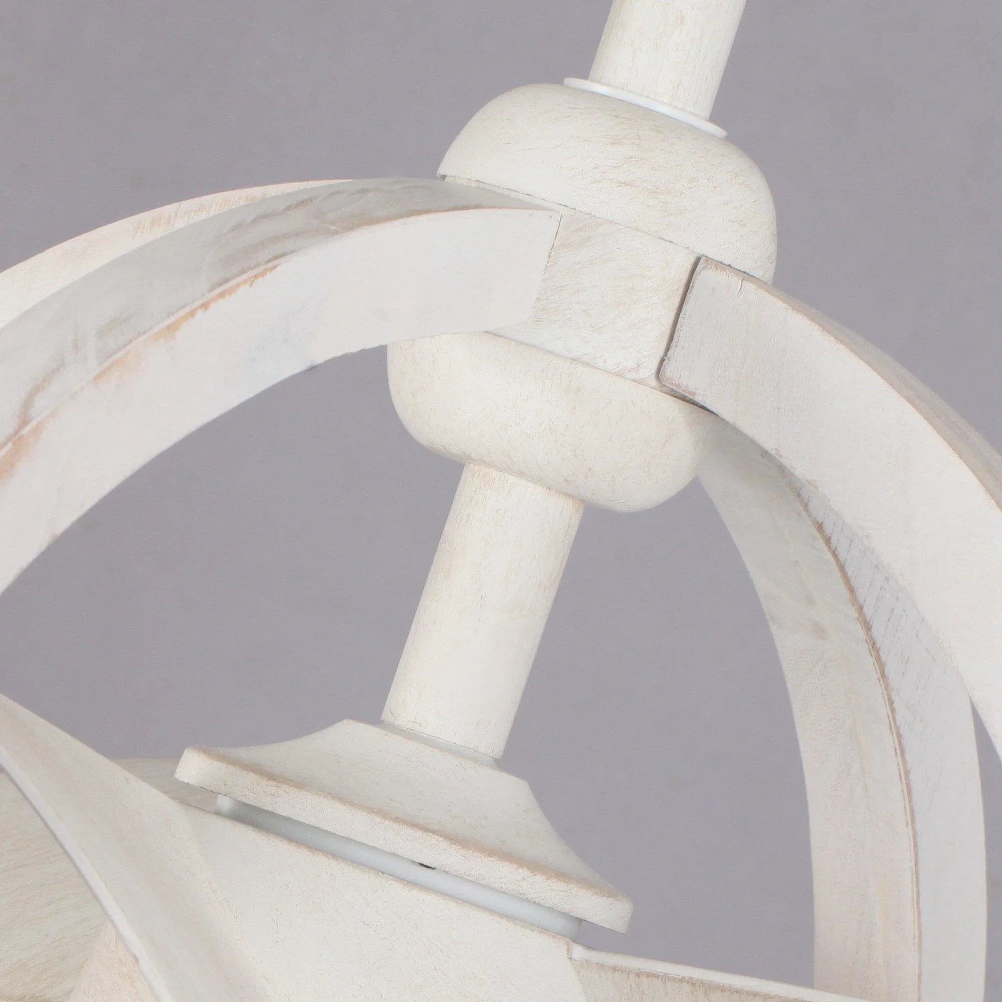 White modern ceiling fan blade and mounting ring detail with central hub