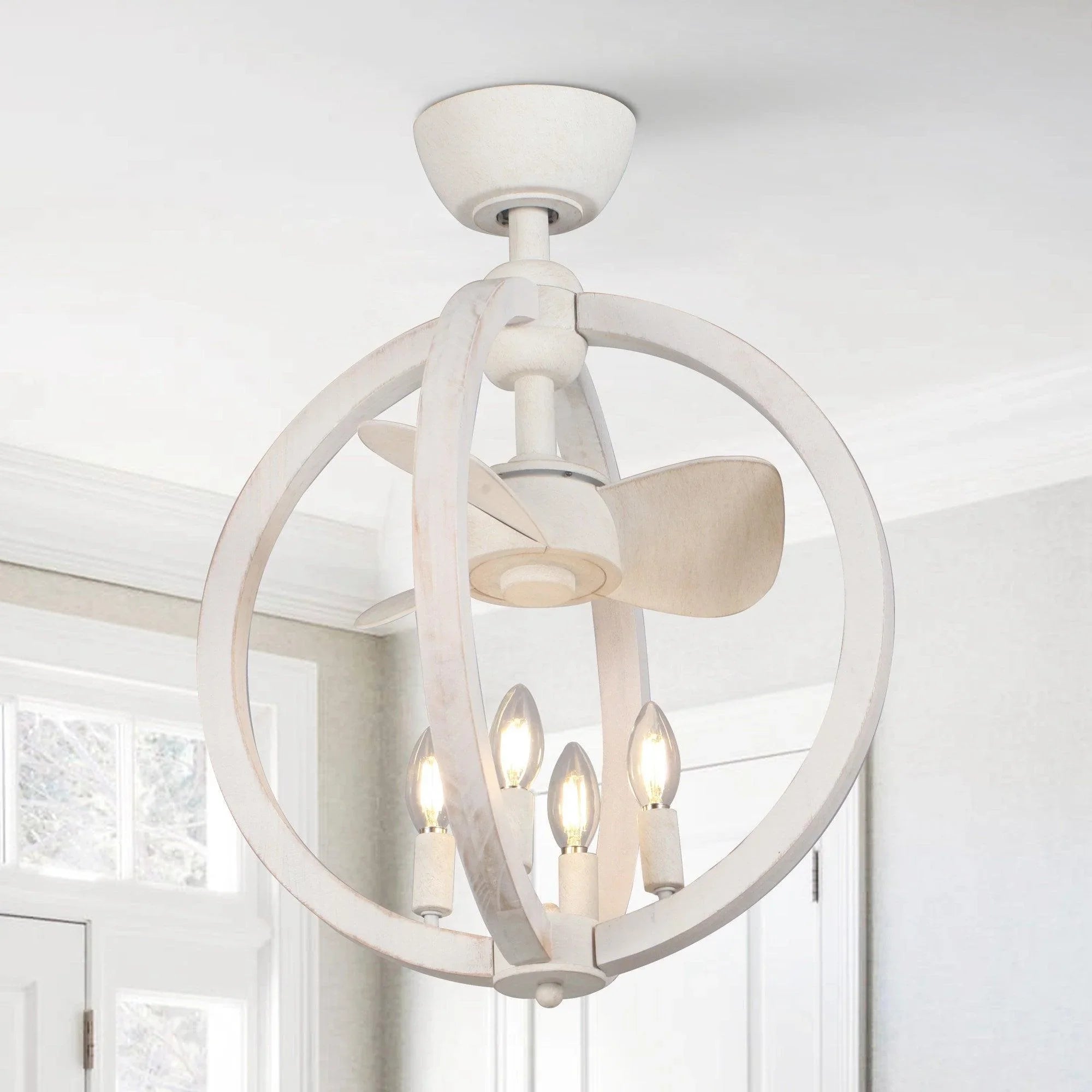 White ceiling fan with light kit and four blades, angled view from below