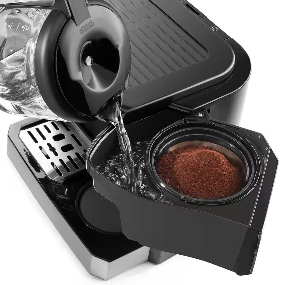 Close-up of De'Longhi espresso machine brew area with ground coffee in portafilter