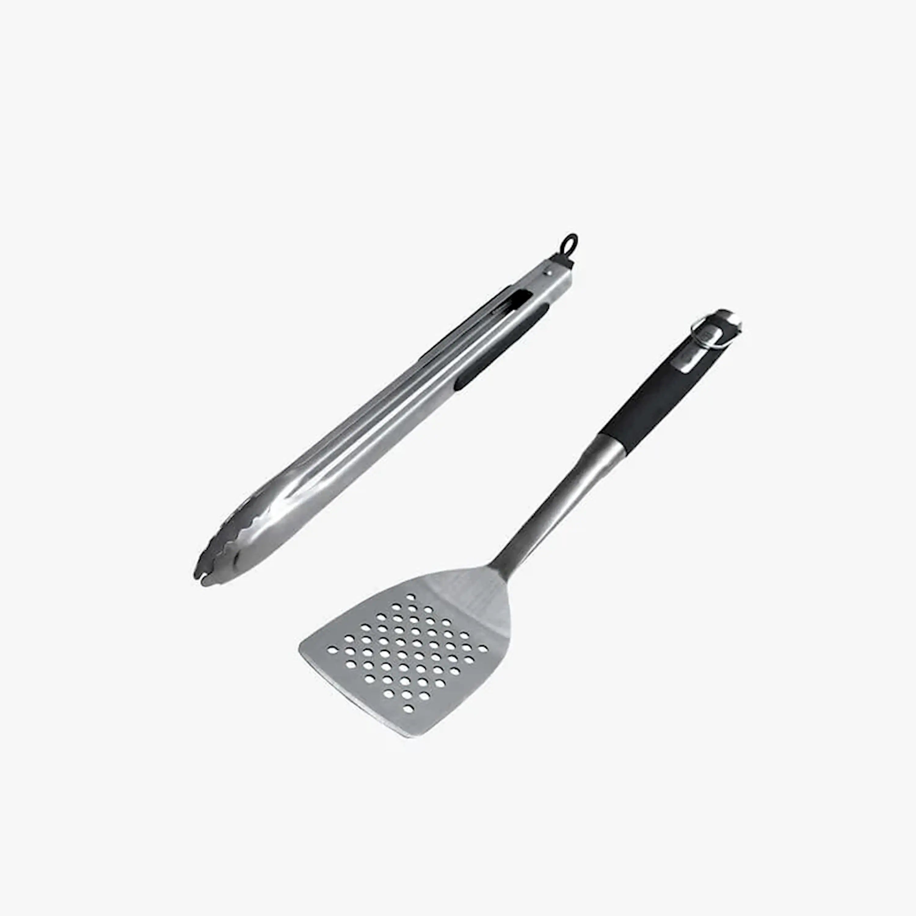 Two stainless steel grilling tools: slotted tong and perforated spatula with black handles
