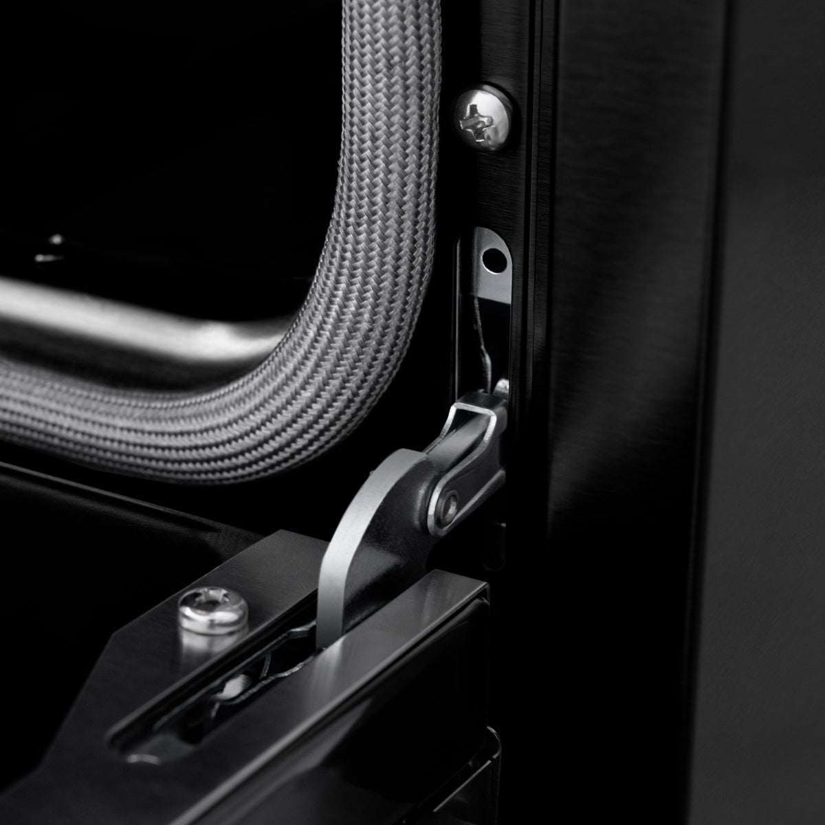 ZLINE Autograph 30-Inch Marino Induction Range in Black Stainless Steel with Champagne Bronze (MINRBZ-30-CB) - StayPut hinge detail