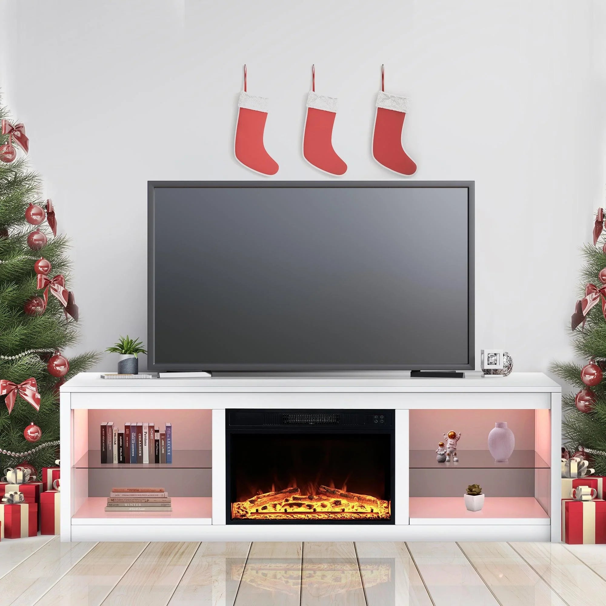 White TV stand with electric fireplace insert and open shelves, warm fire centered.