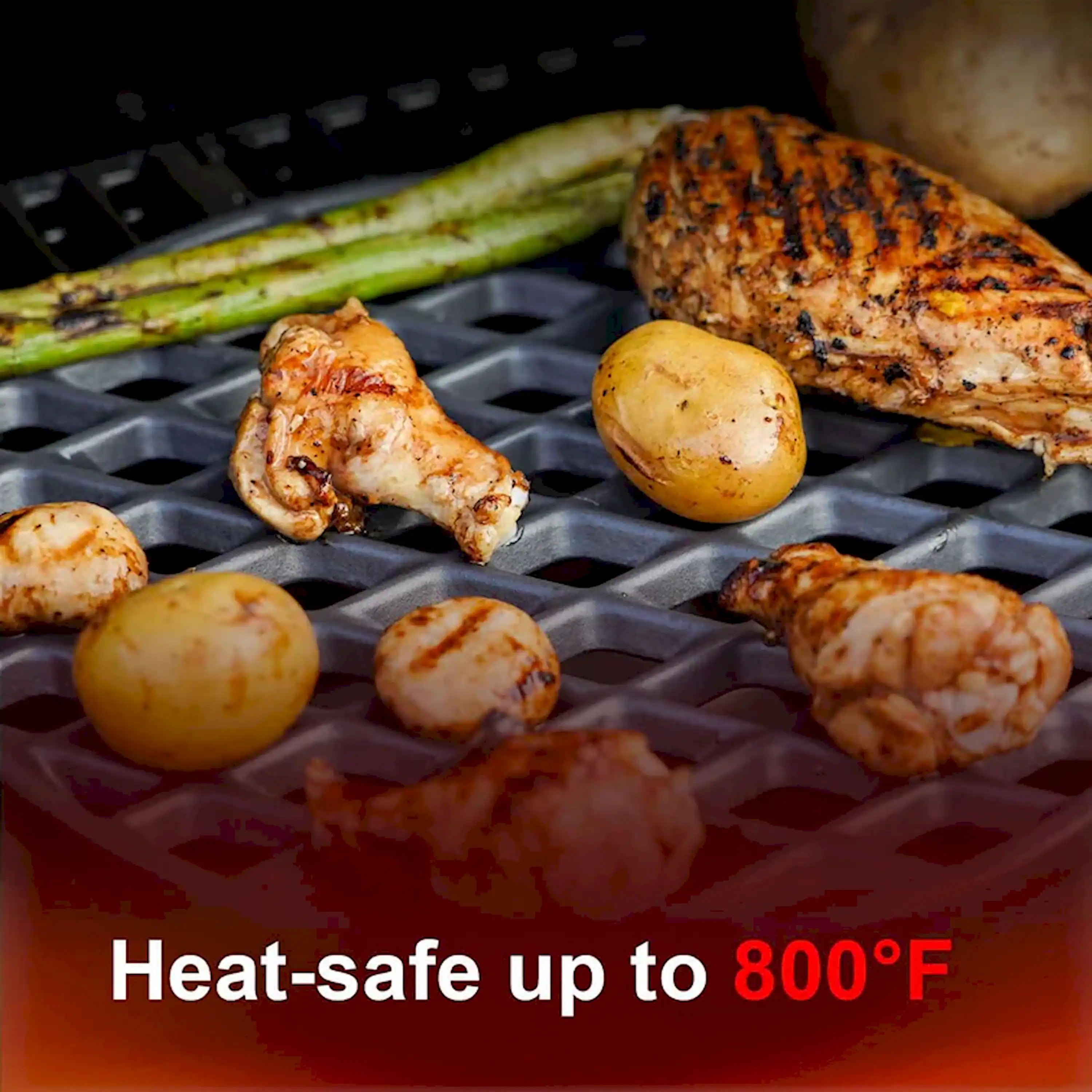 Round diamond-grid cast iron grill grate holding chicken and potatoes