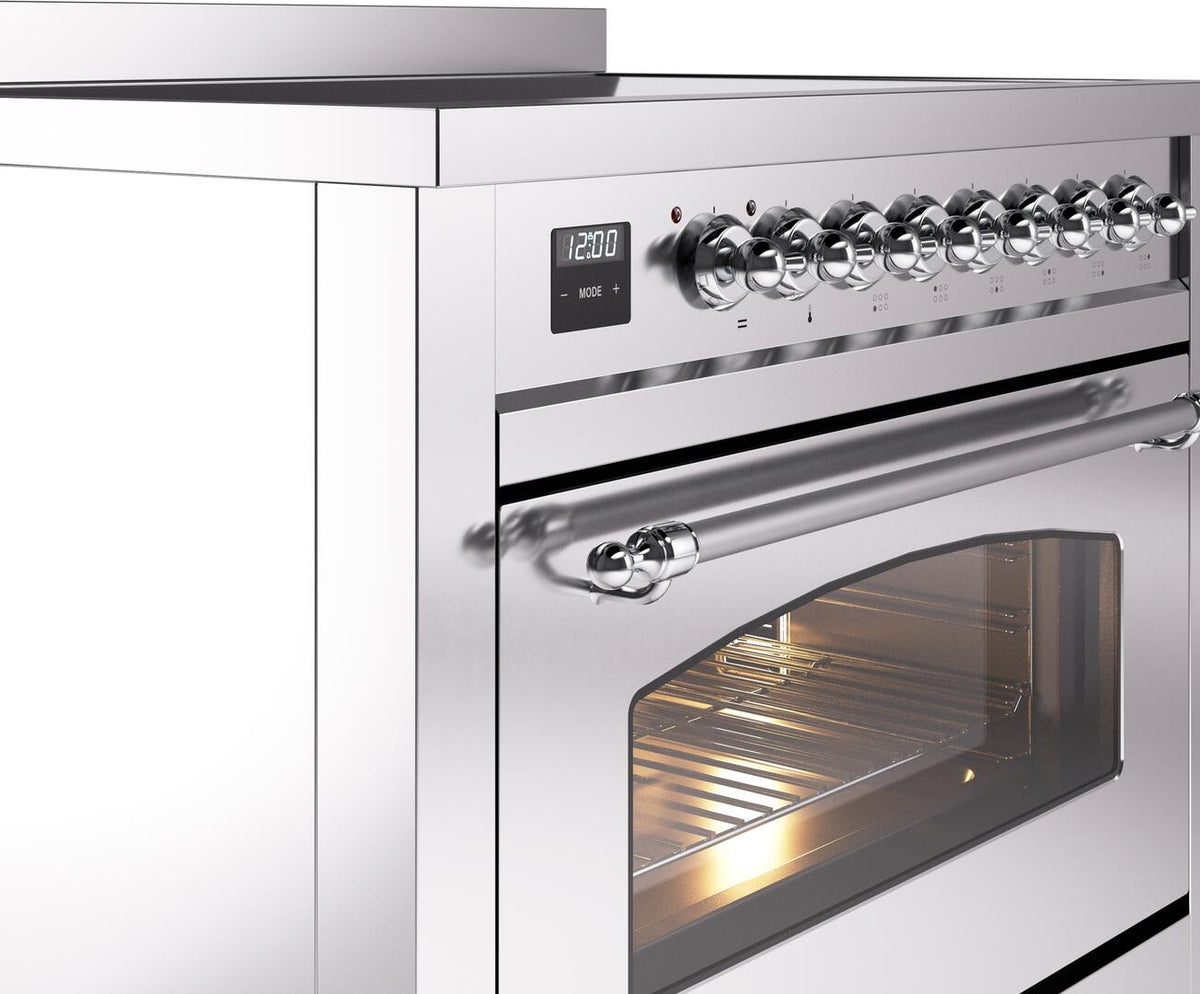 Stainless steel oven with digital display and row of chrome control knobs above glass window