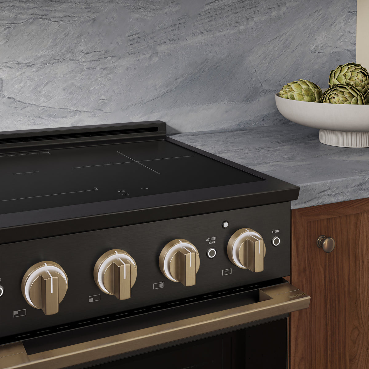 ZLINE Autograph 24-Inch Marino Induction Range in Black Stainless Steel with Champagne Bronze (MINRBZ-24-CB) - kitchen lifestyle view