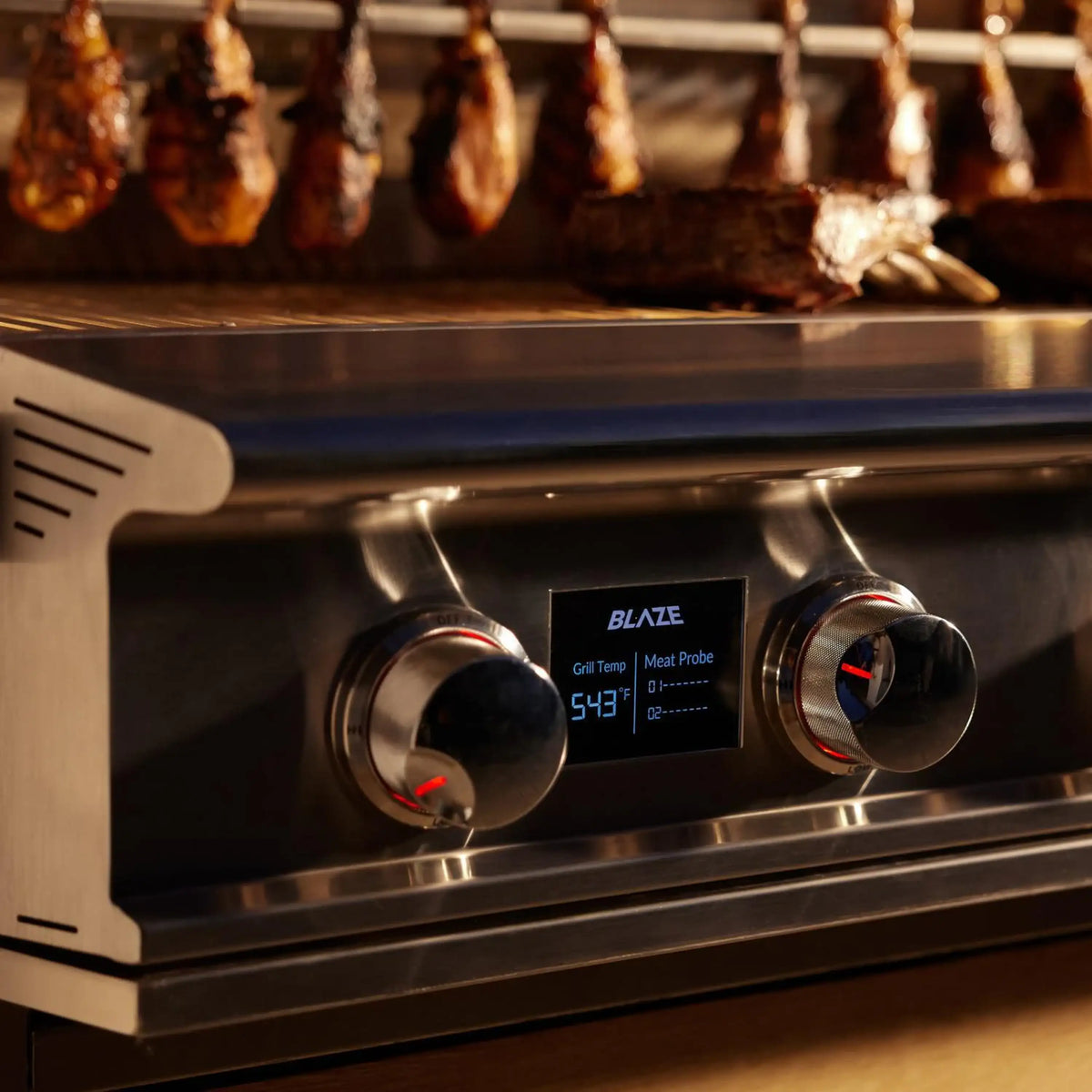Stainless steel natural gas grill control panel with digital temperature display and knobs