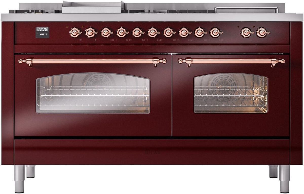 Burgundy dual fuel range with copper handles and two lit oven windows, burner knobs on back panel