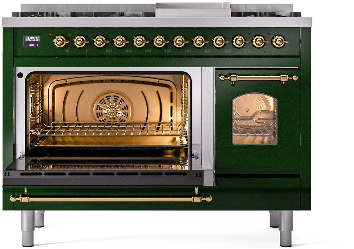 Dual fuel range with open oven doors on emerald green body and brass control hardware