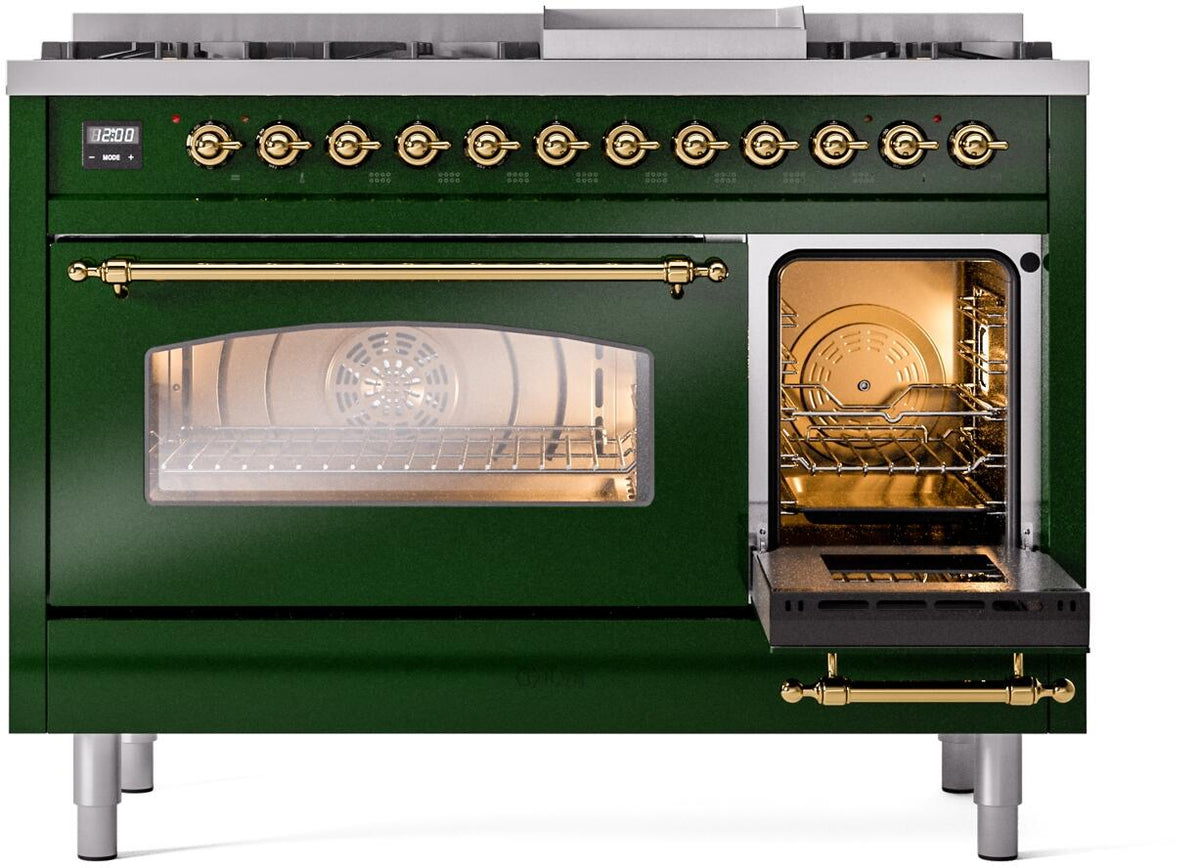 Emerald green range with oven door open, glowing interior, and brass handle and knobs