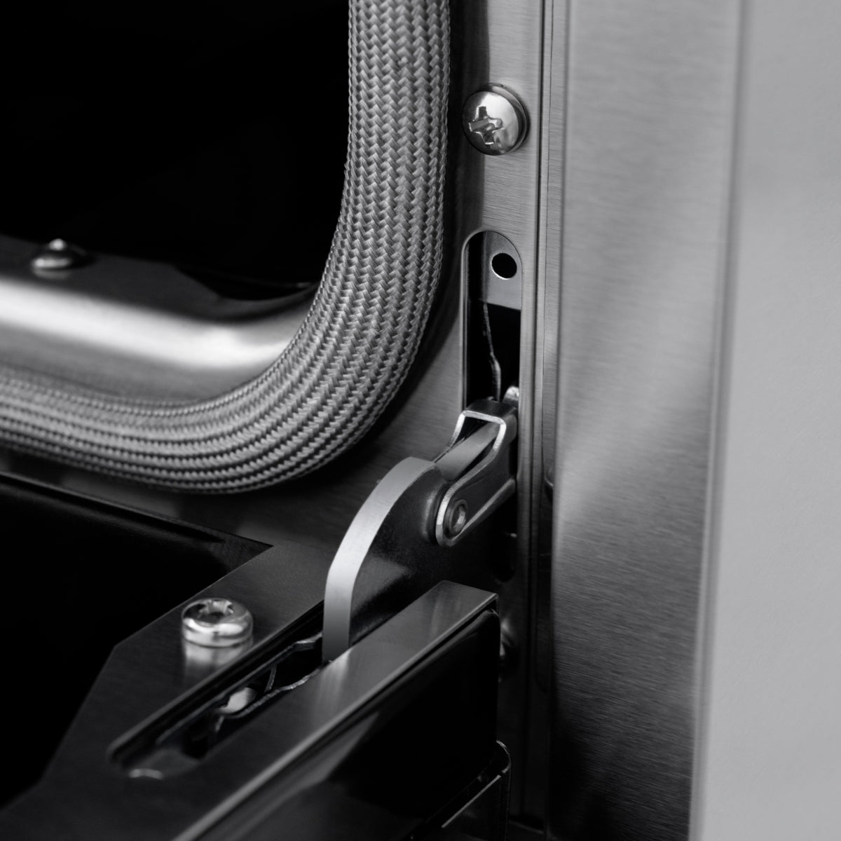 ZLINE Autograph 36-Inch Marino Induction Range in Stainless Steel with Champagne Bronze (MINRZ-36-CB) - StayPut hinge detail