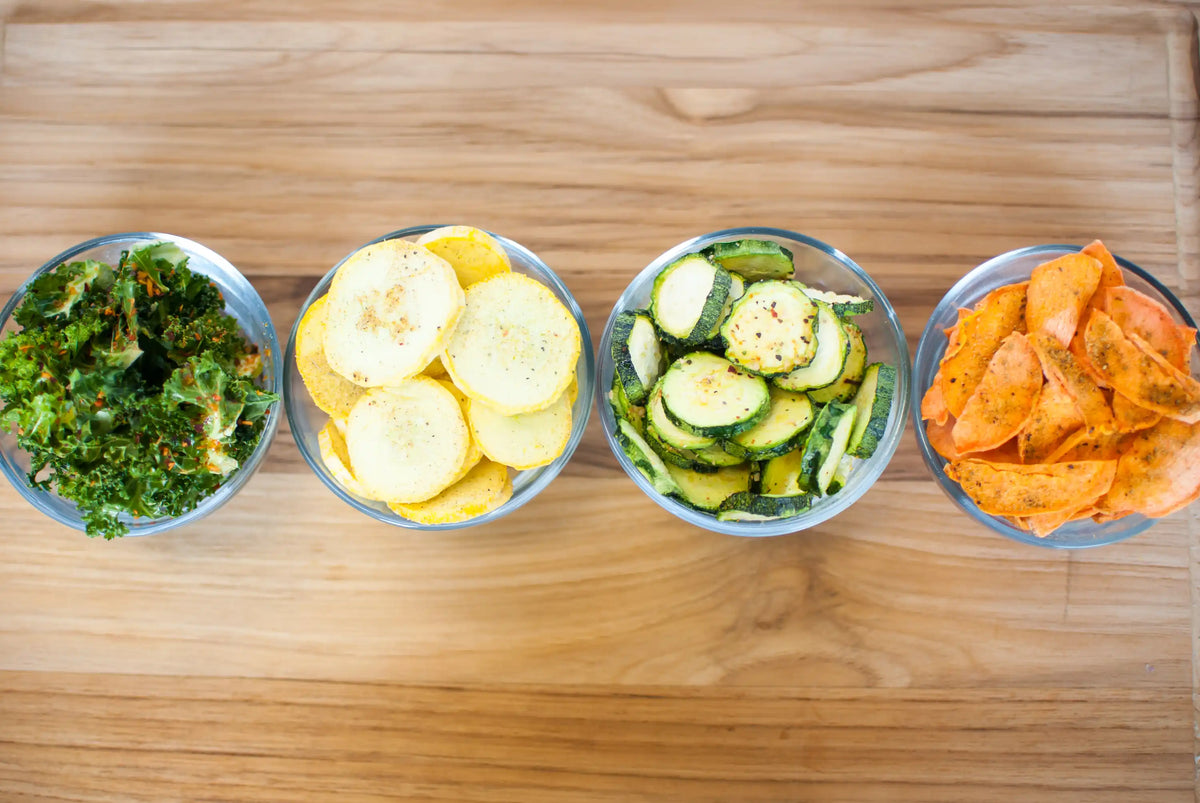Harvest Right freeze dryer starter: four small bowls of sliced vegetables on a board